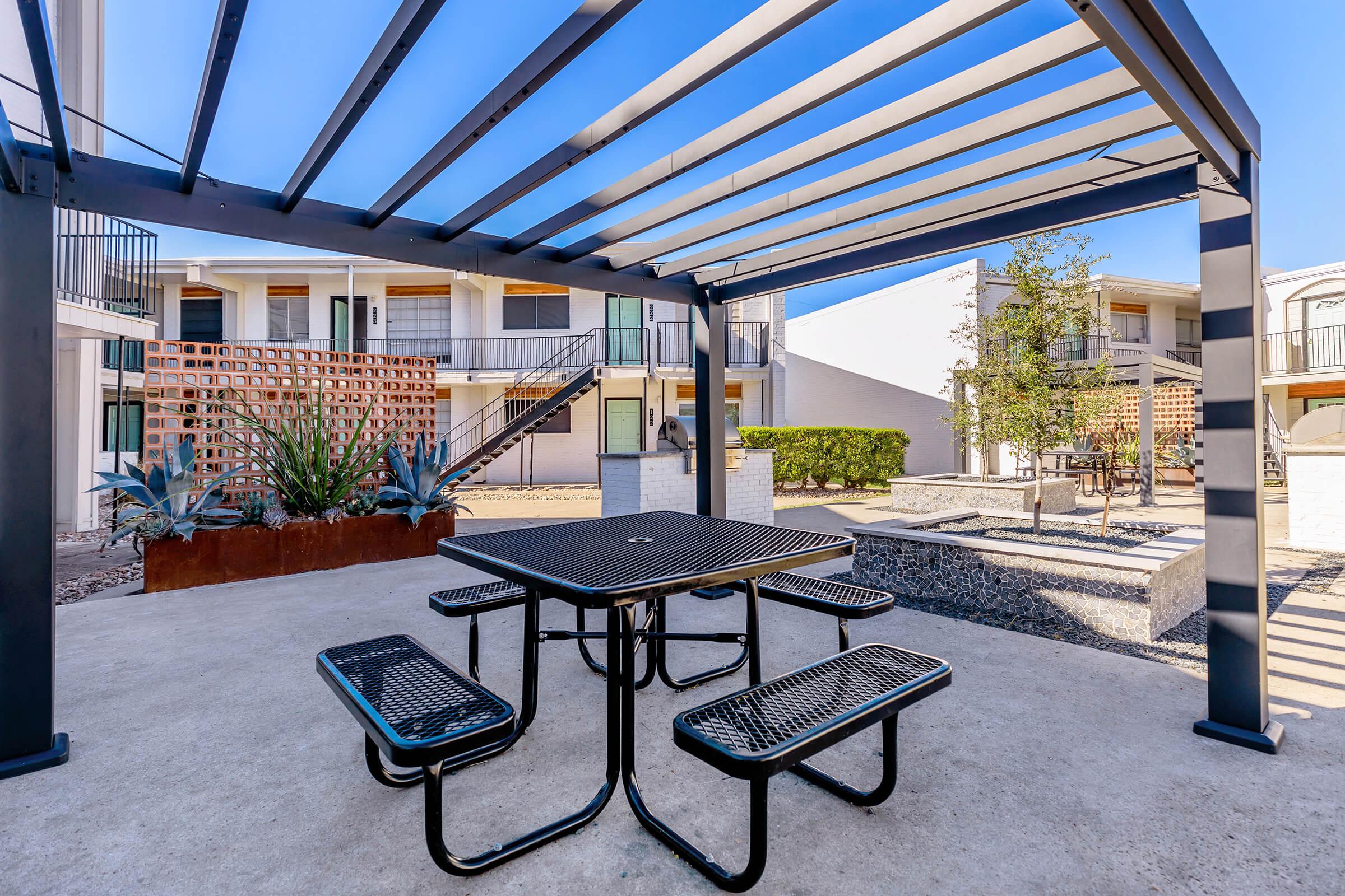 a building with a metal bench