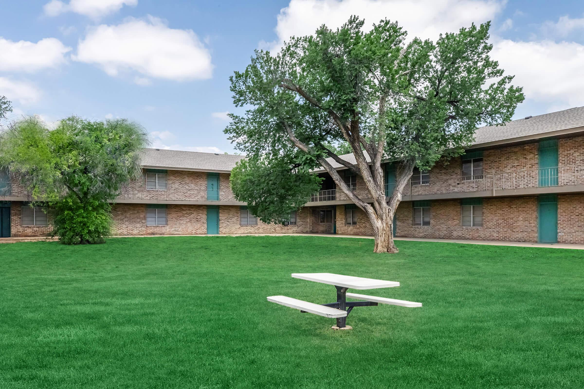 a large lawn in front of a house