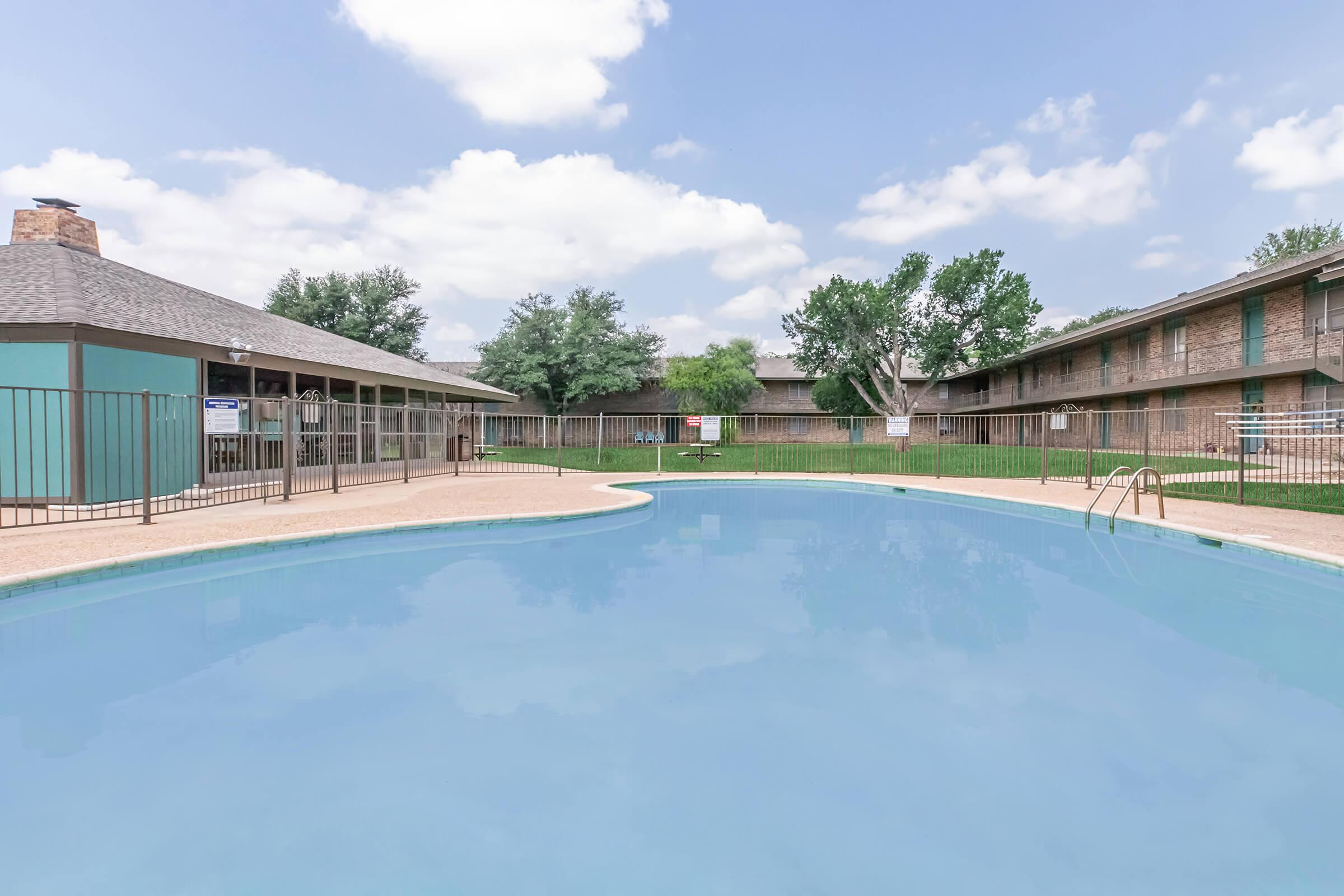 a pool next to a building