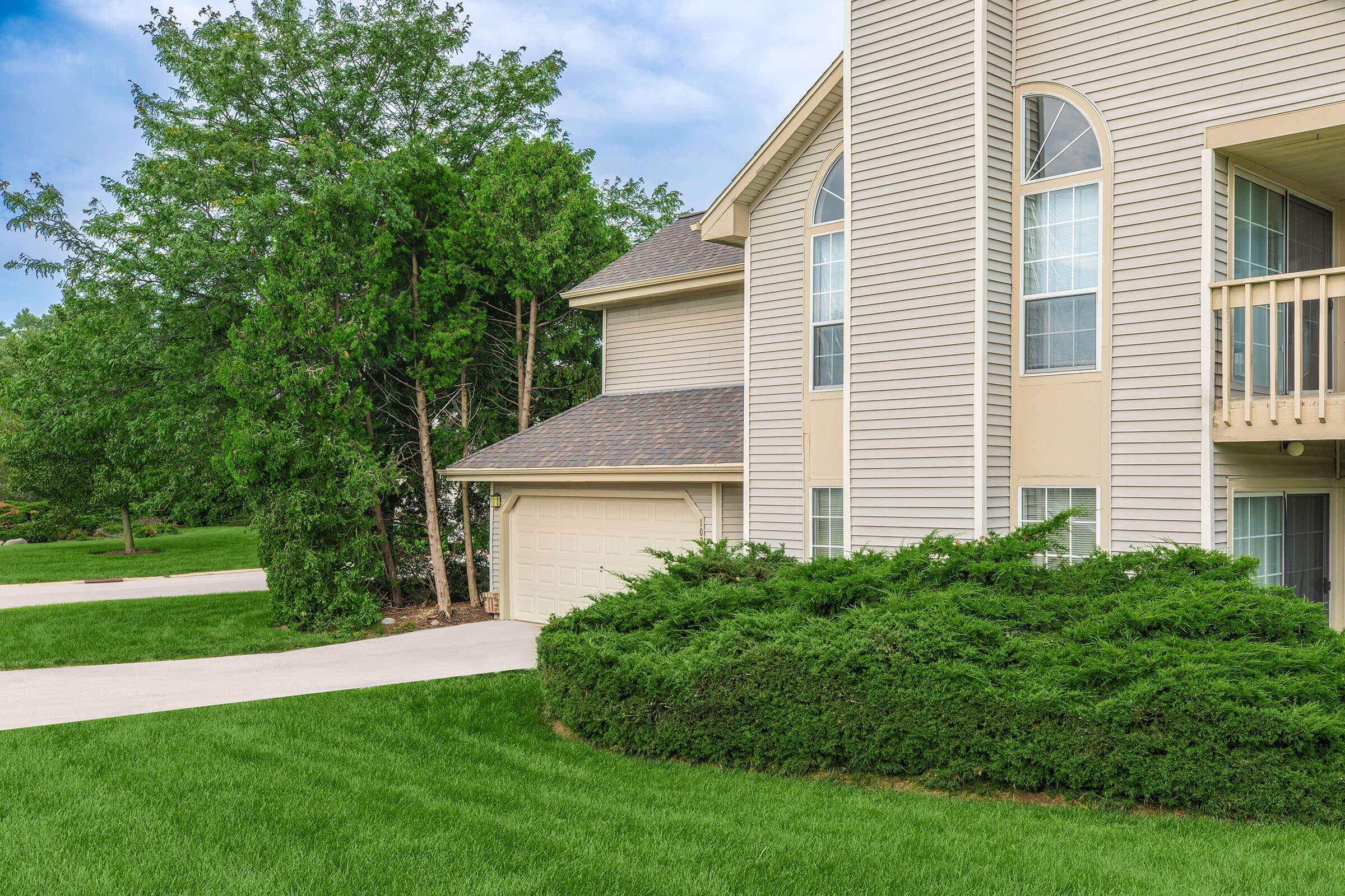 a large lawn in front of a house