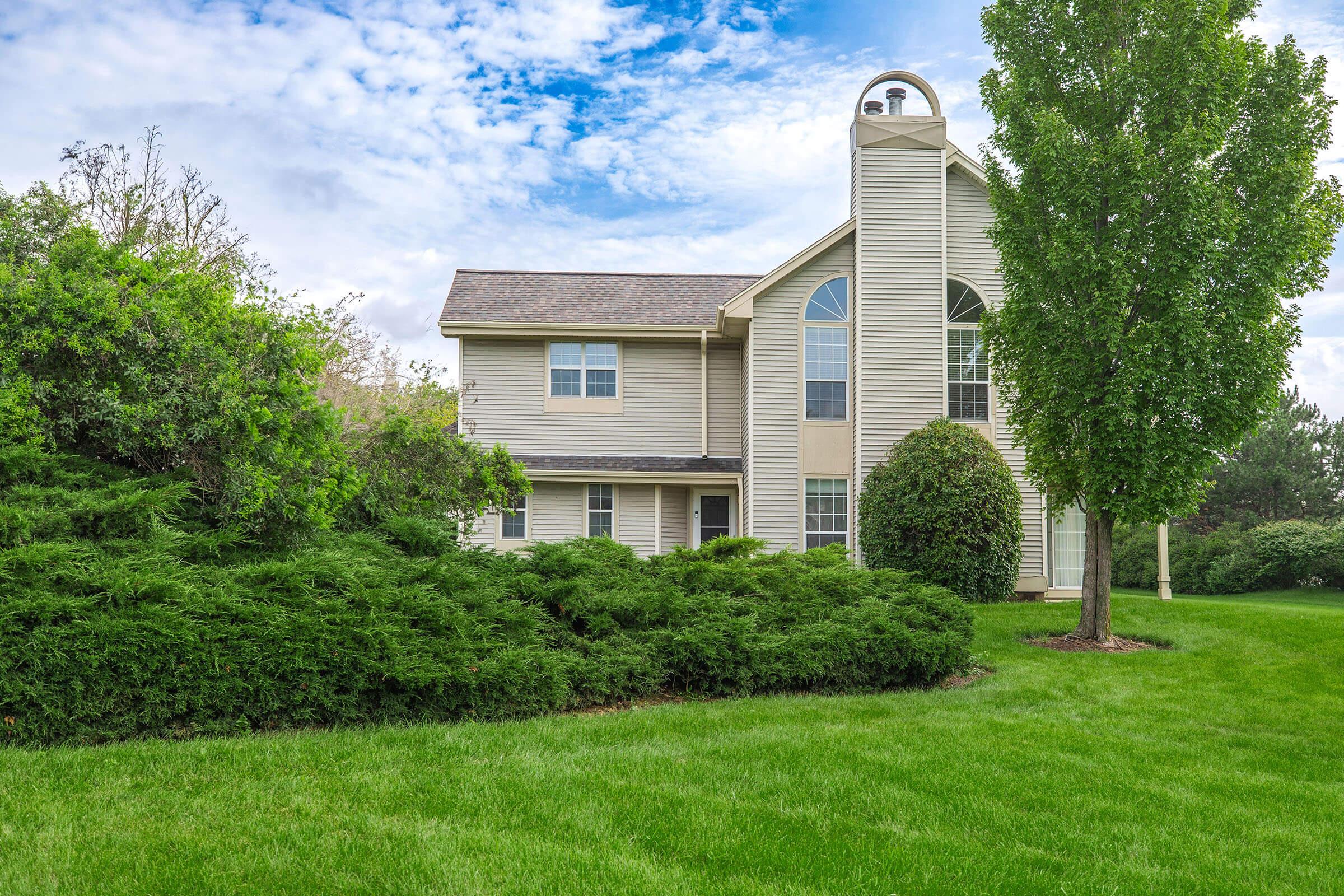 a large lawn in front of a house