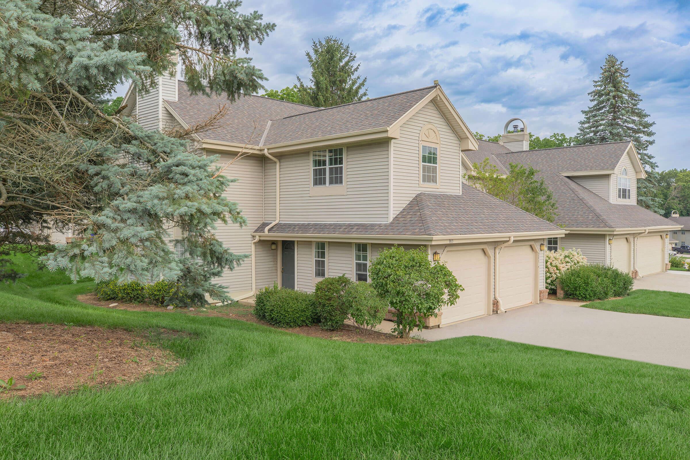 a large lawn in front of a house