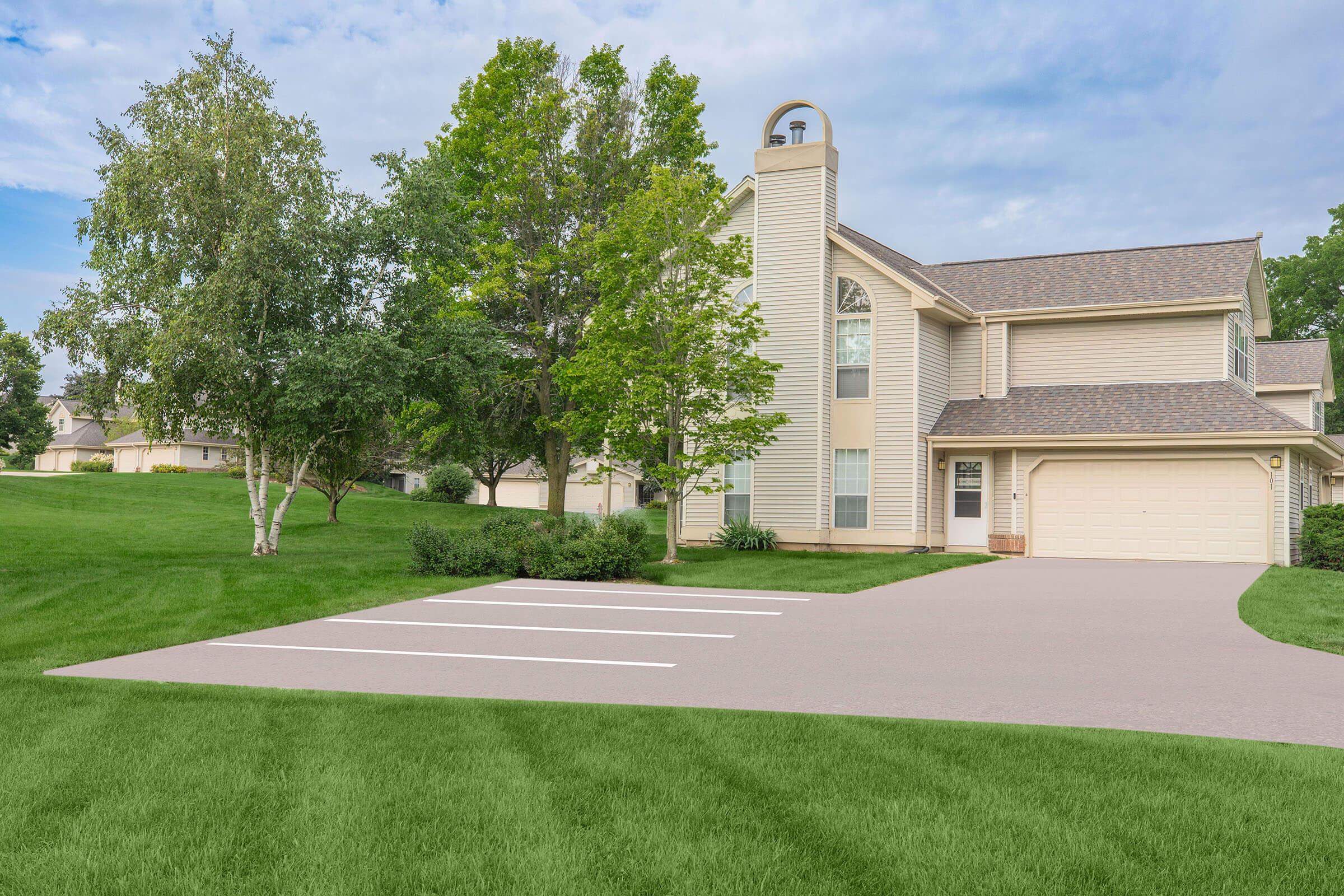 a large lawn in front of a house