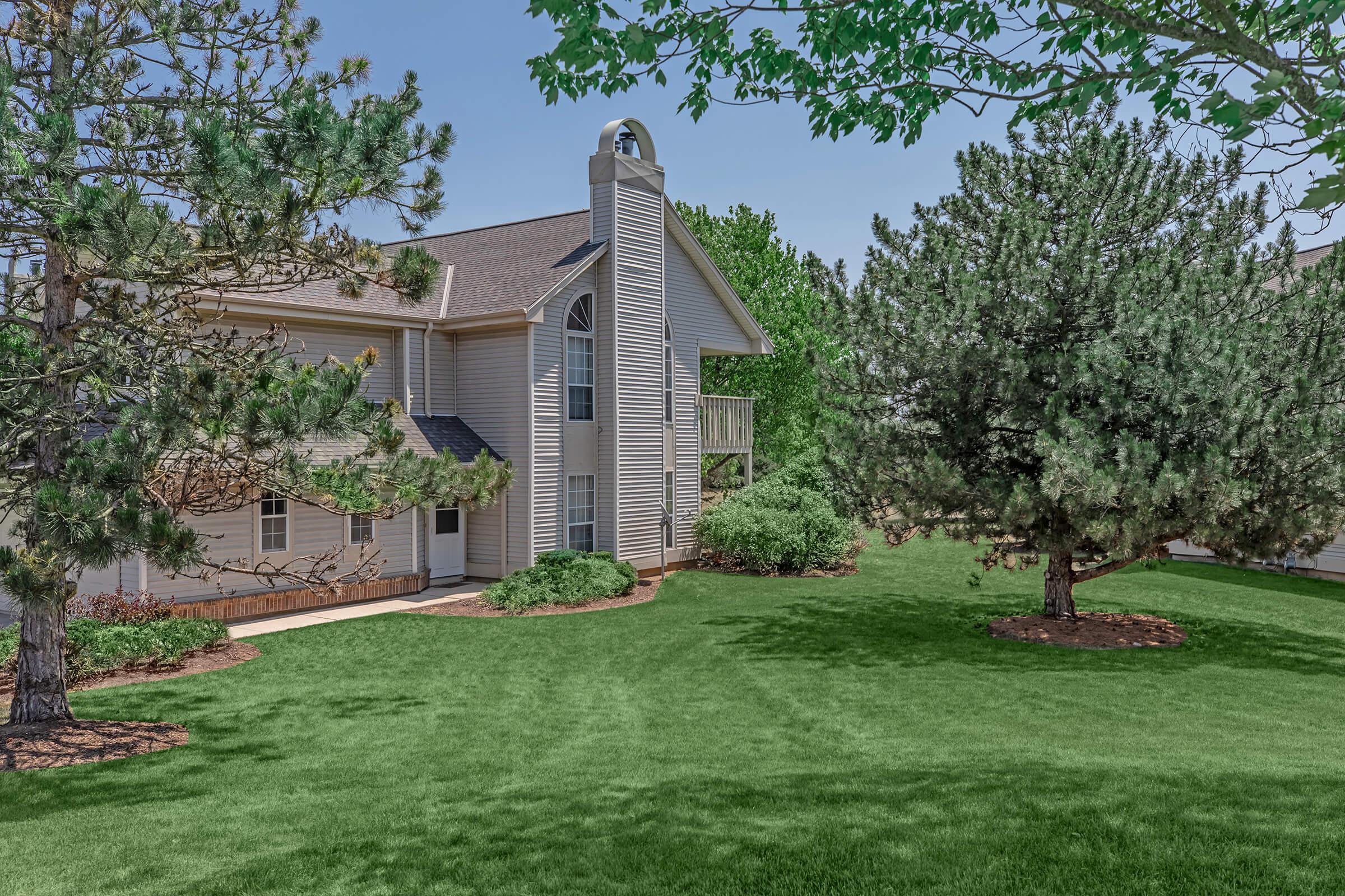 a large lawn in front of a house