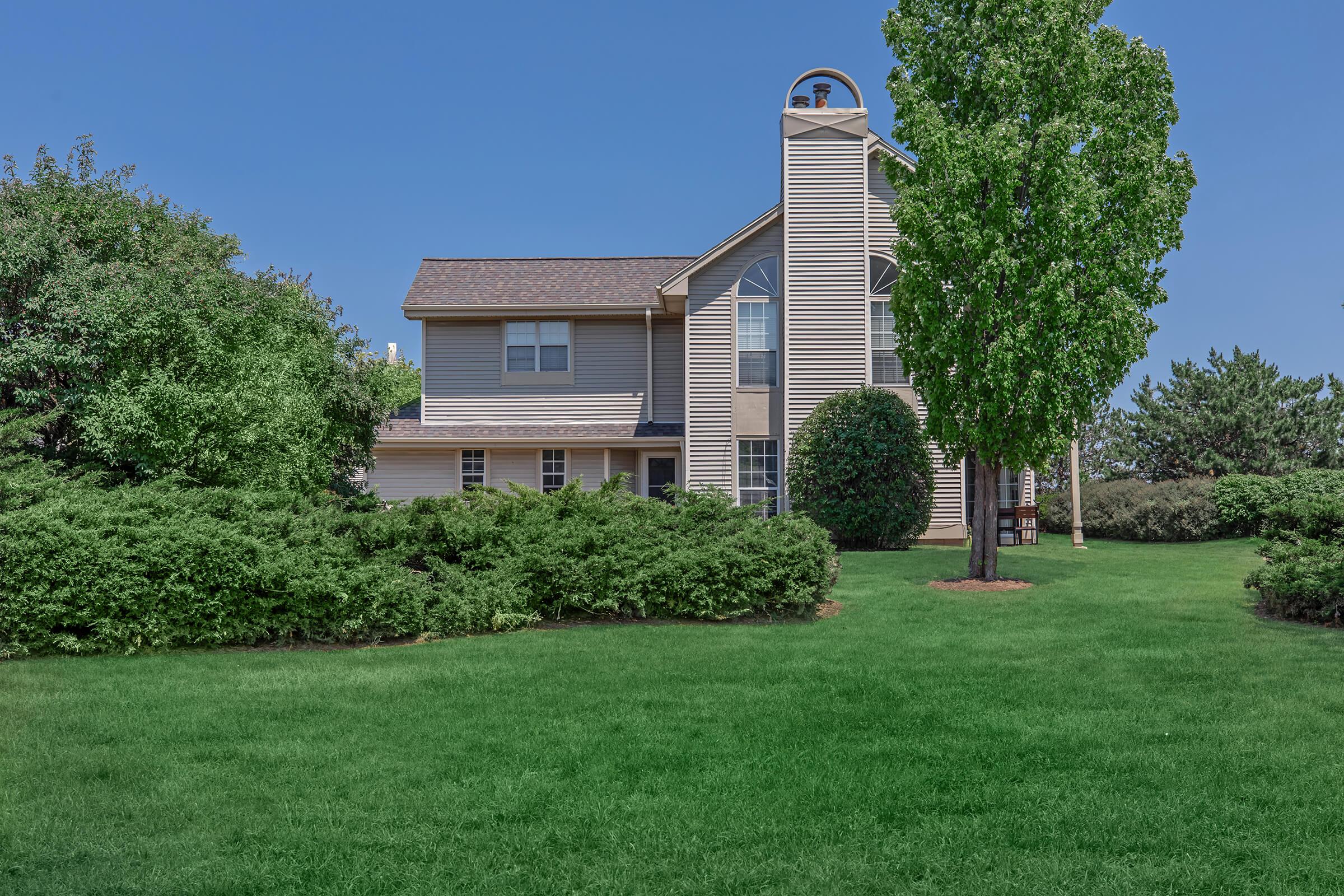 a large lawn in front of a house