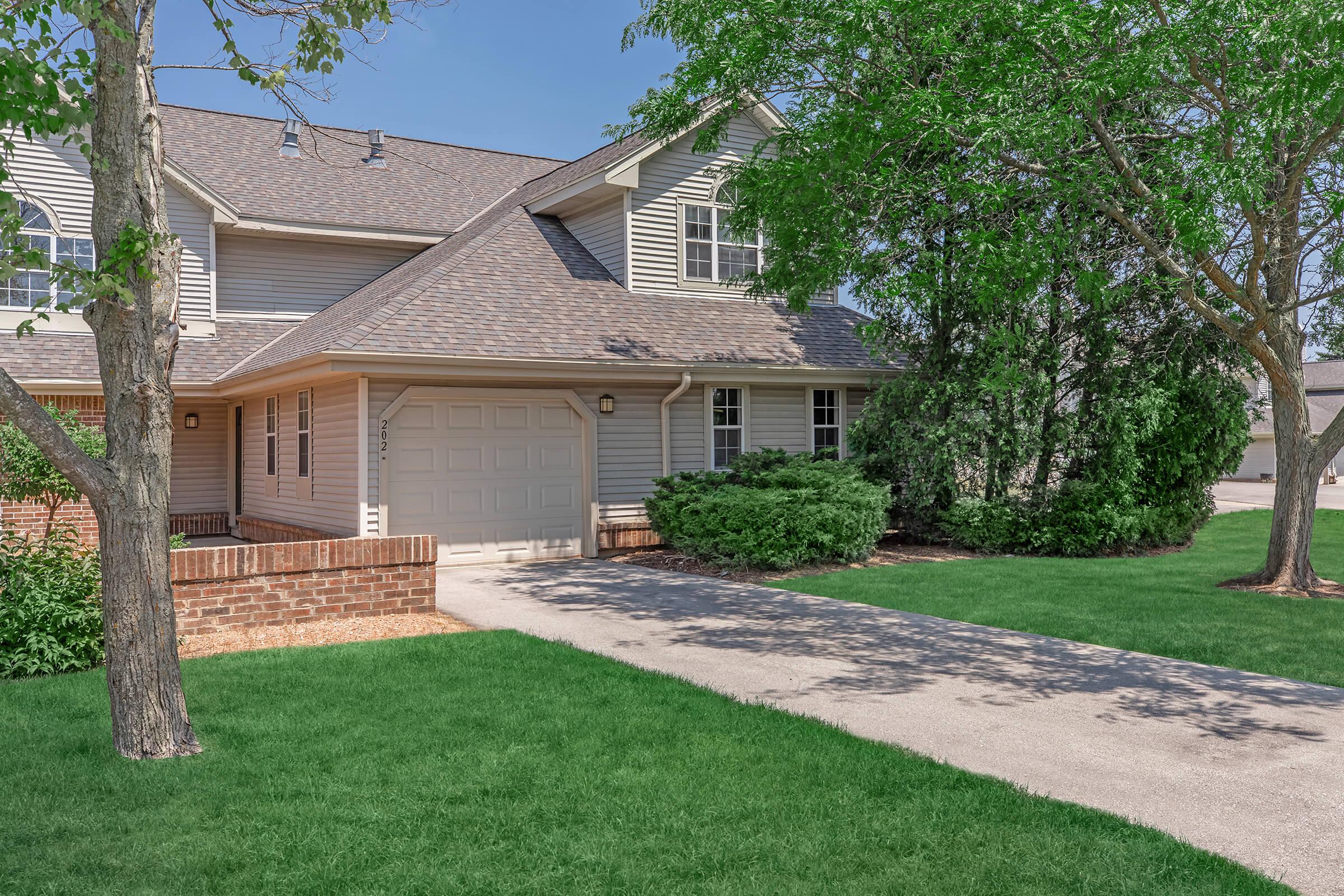 a large lawn in front of a house