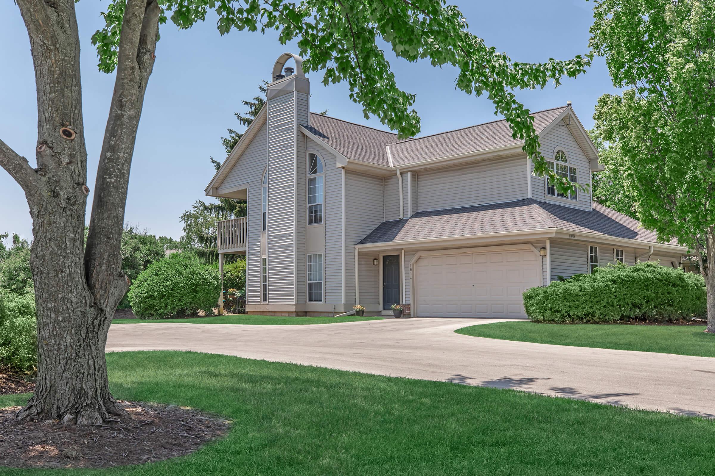 a large lawn in front of a house