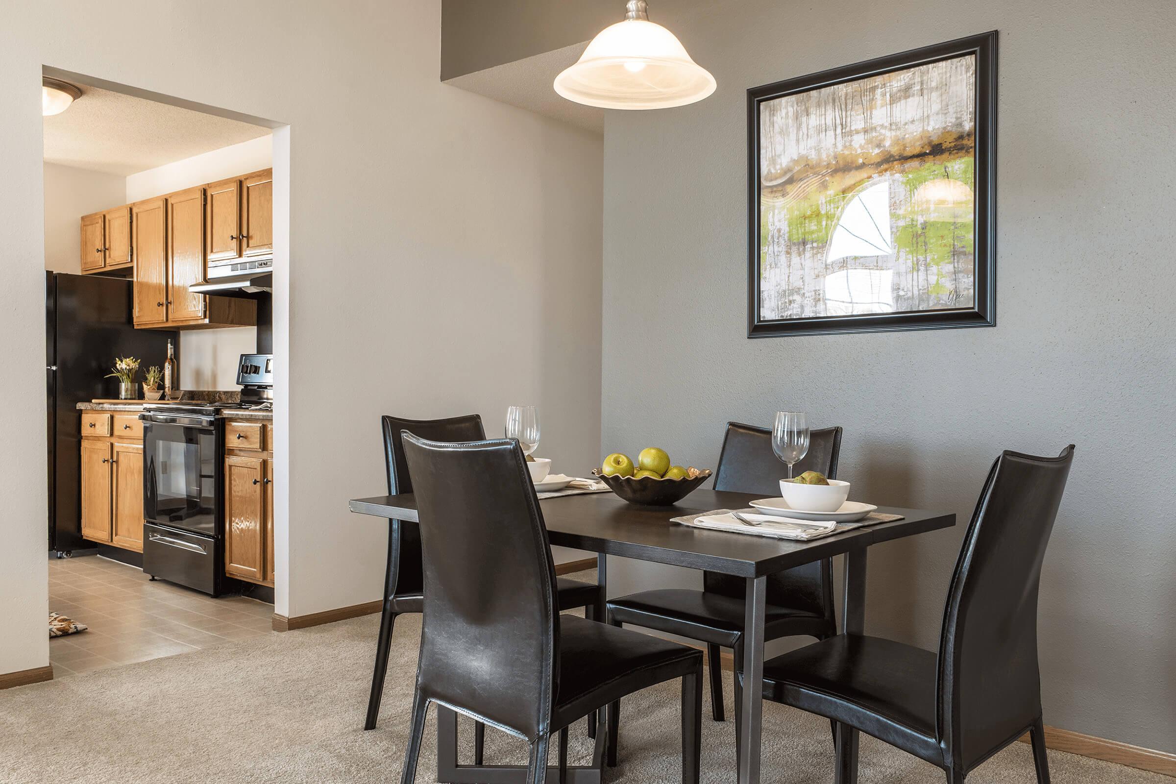 a room filled with furniture and a table