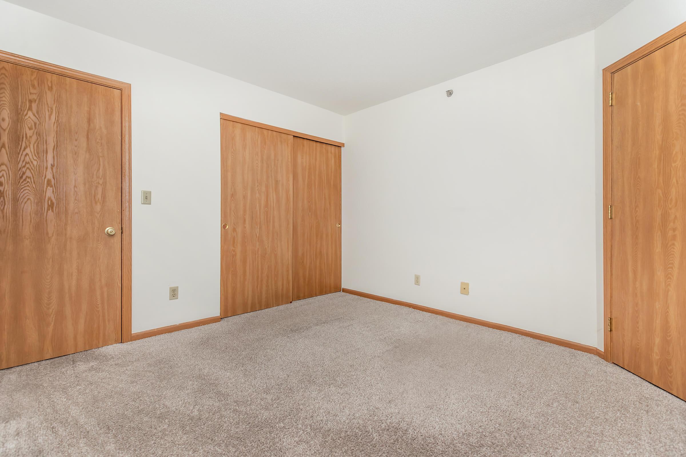 a wooden door in a room