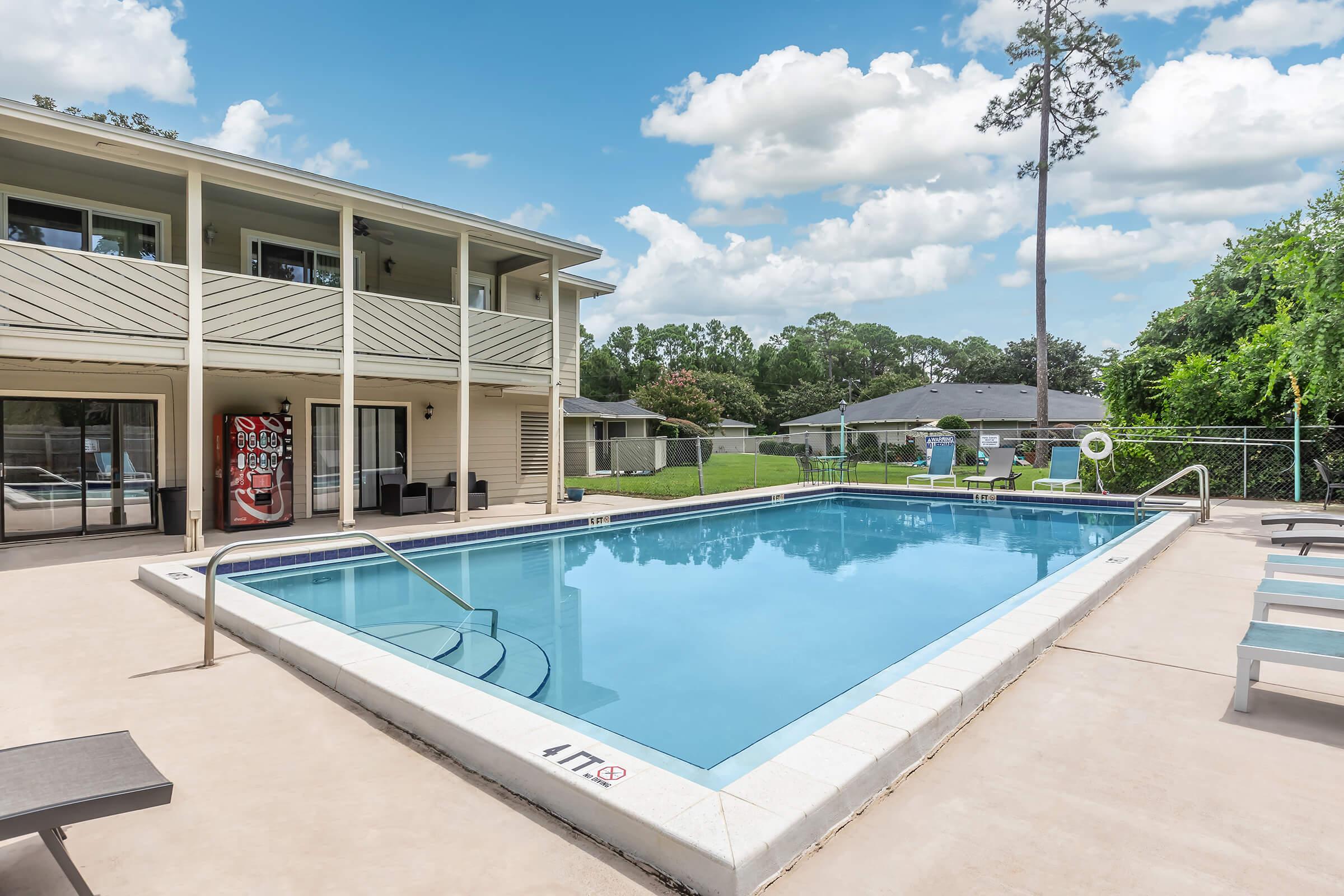 a pool next to a building