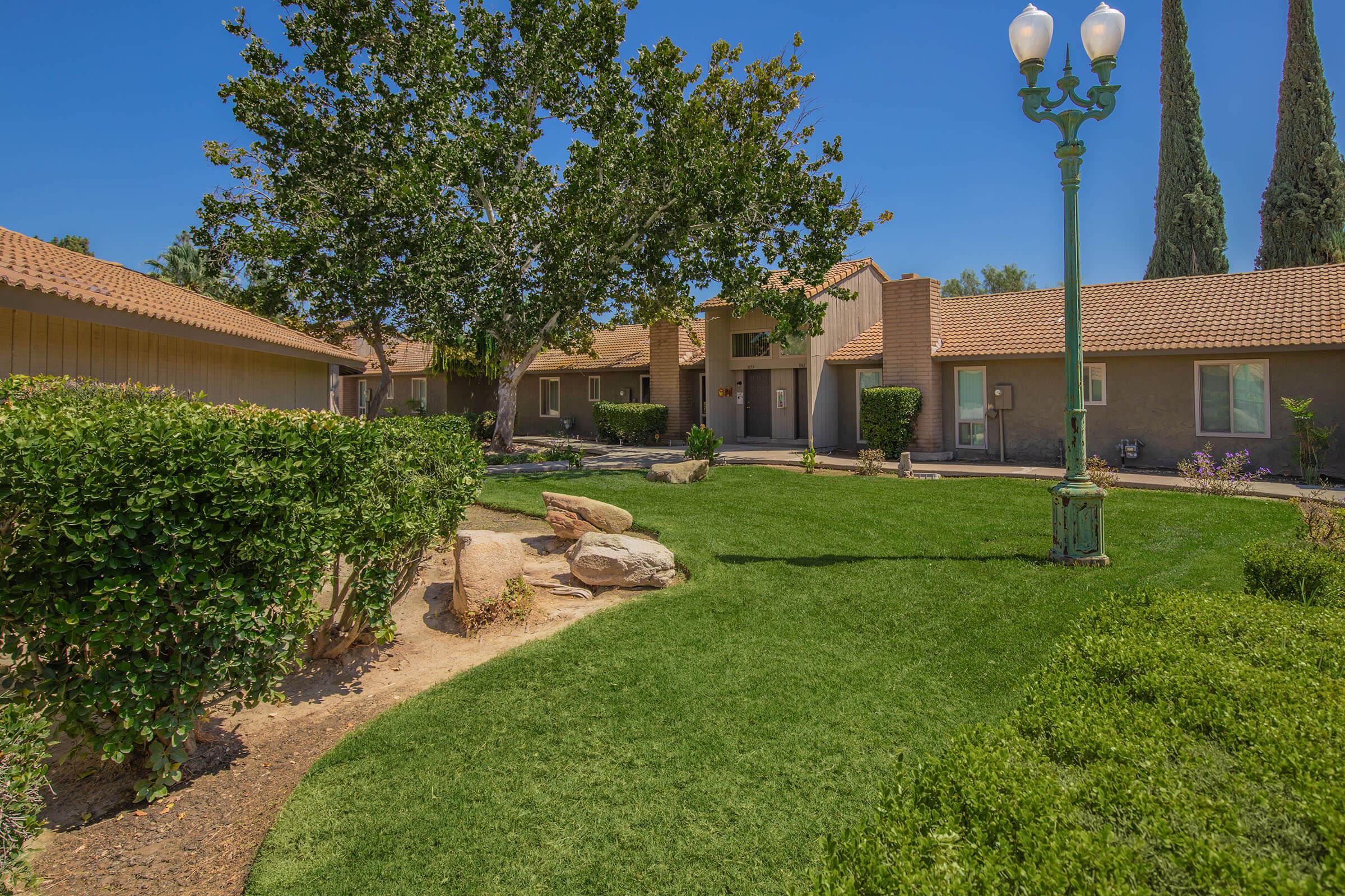 a large lawn in front of a house