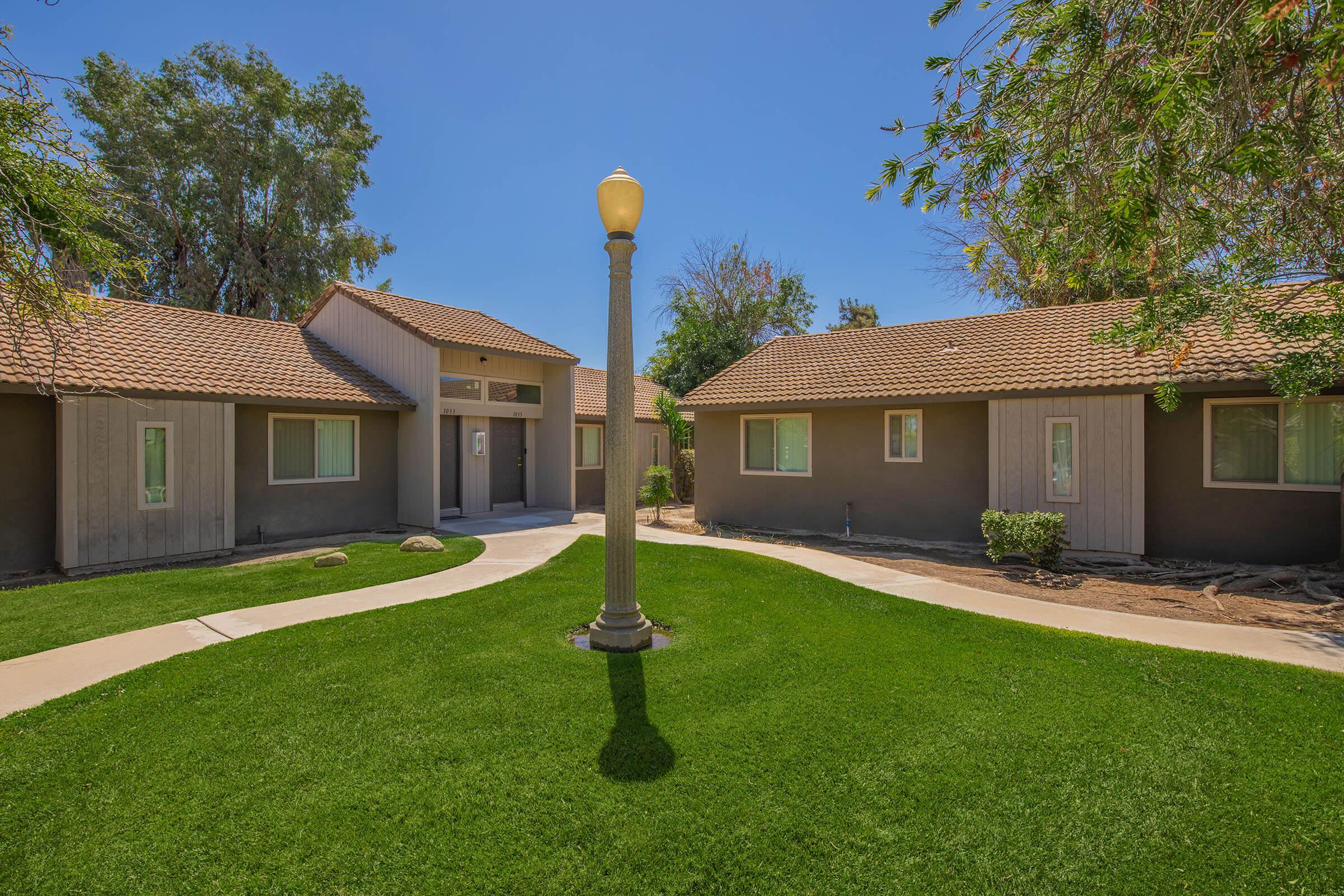 a large lawn in front of a house