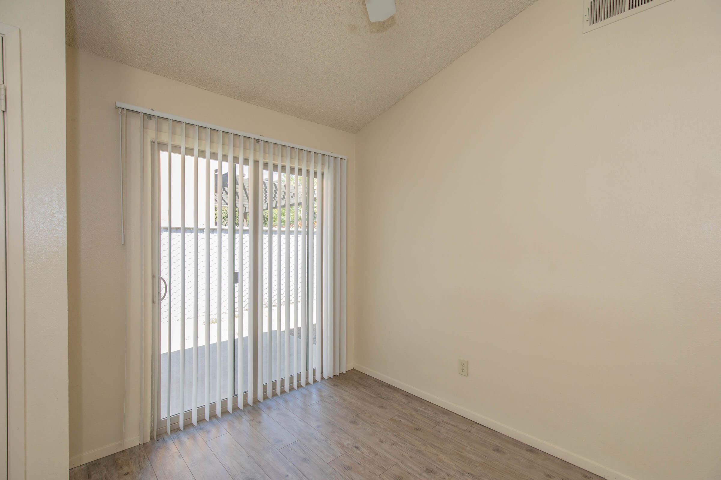 a room with a sink and a window