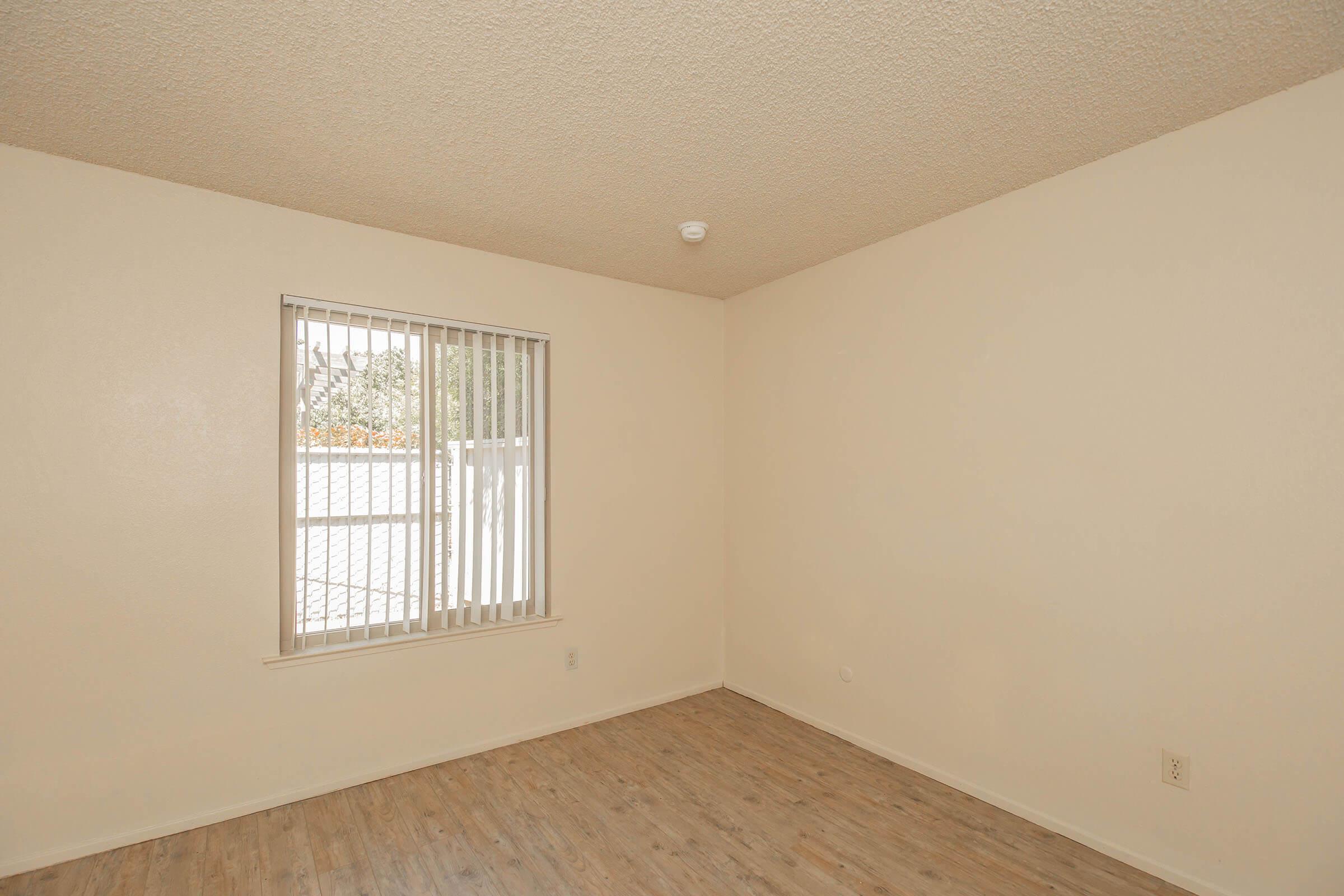 a room with a sink and a window