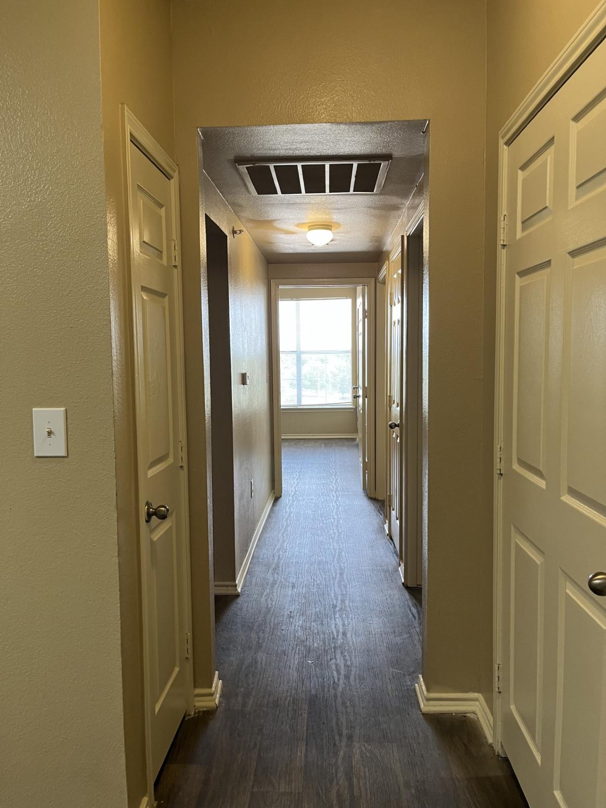 Step into your new home where spacious hallways invite natural light and seamless living flows, making every moment feel bright and welcoming.