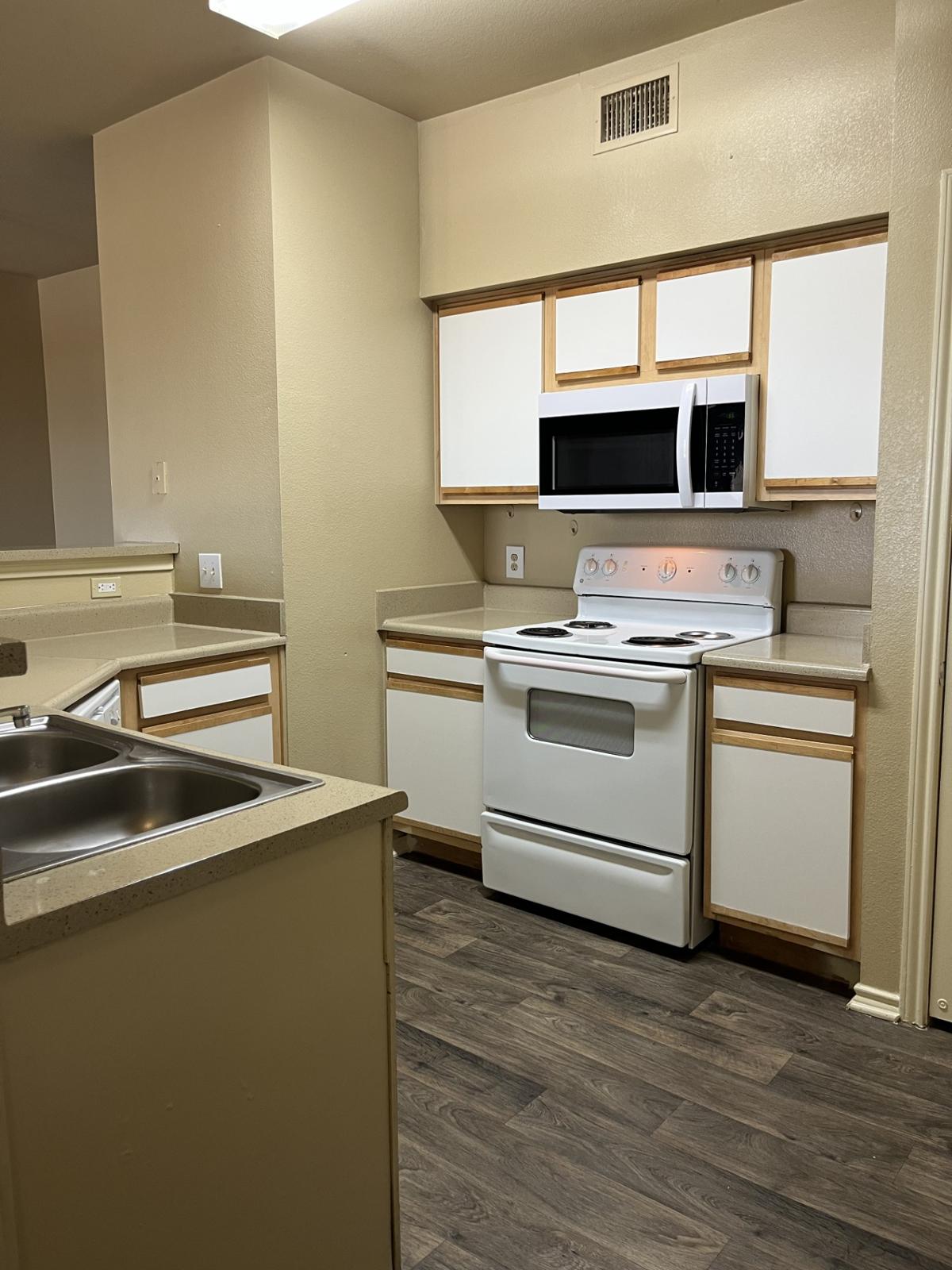 Experience the perfect blend of cozy comfort and modern convenience in this inviting kitchen, designed for both culinary adventures and effortless entertaining.