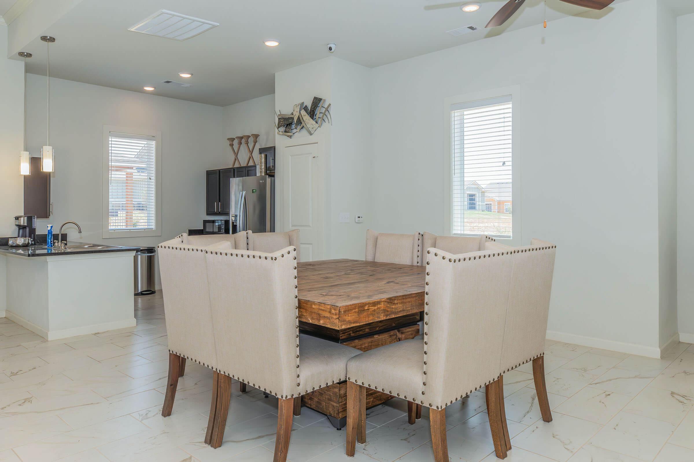 a room filled with furniture and a table