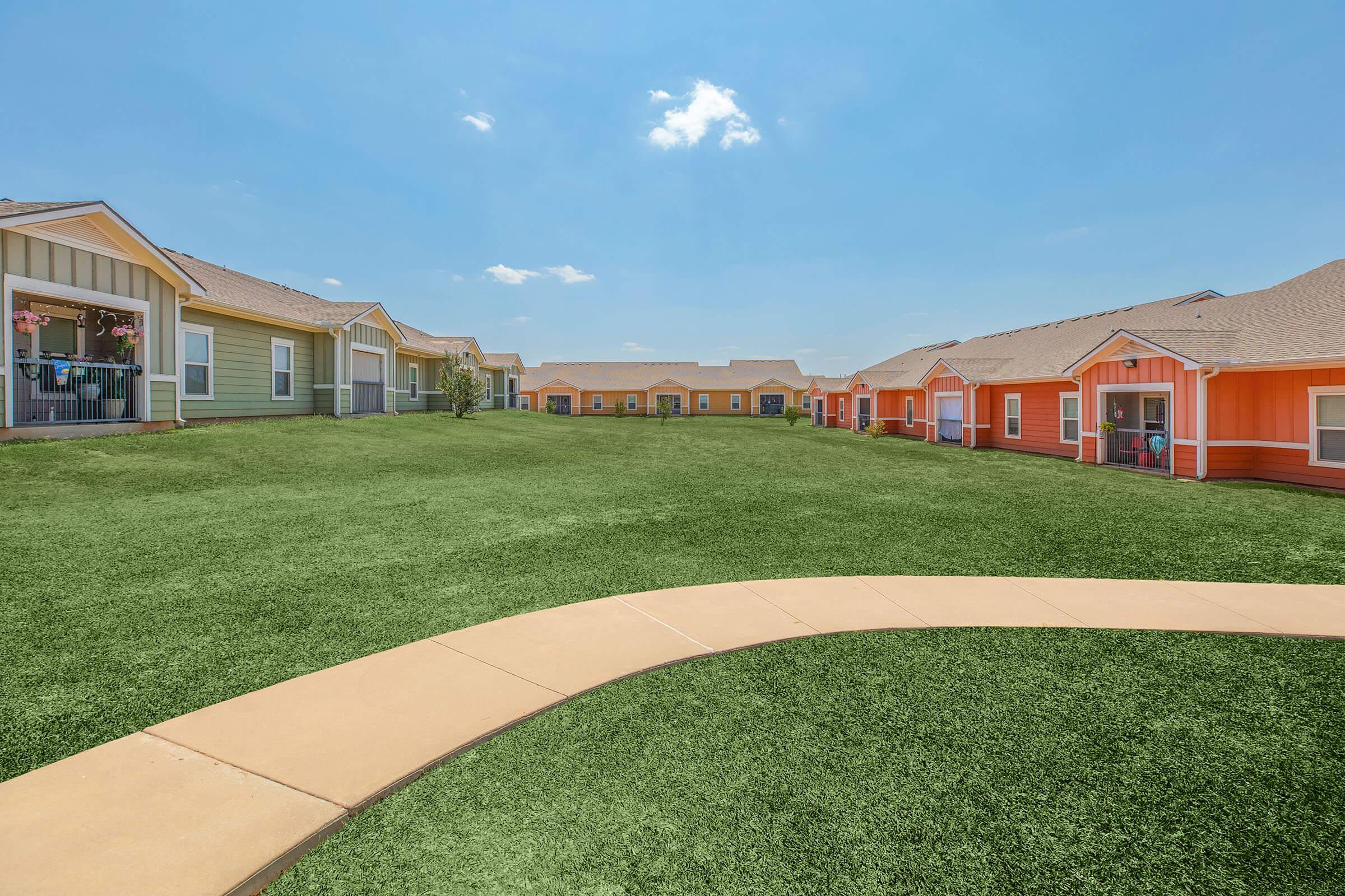 a large lawn in front of a house