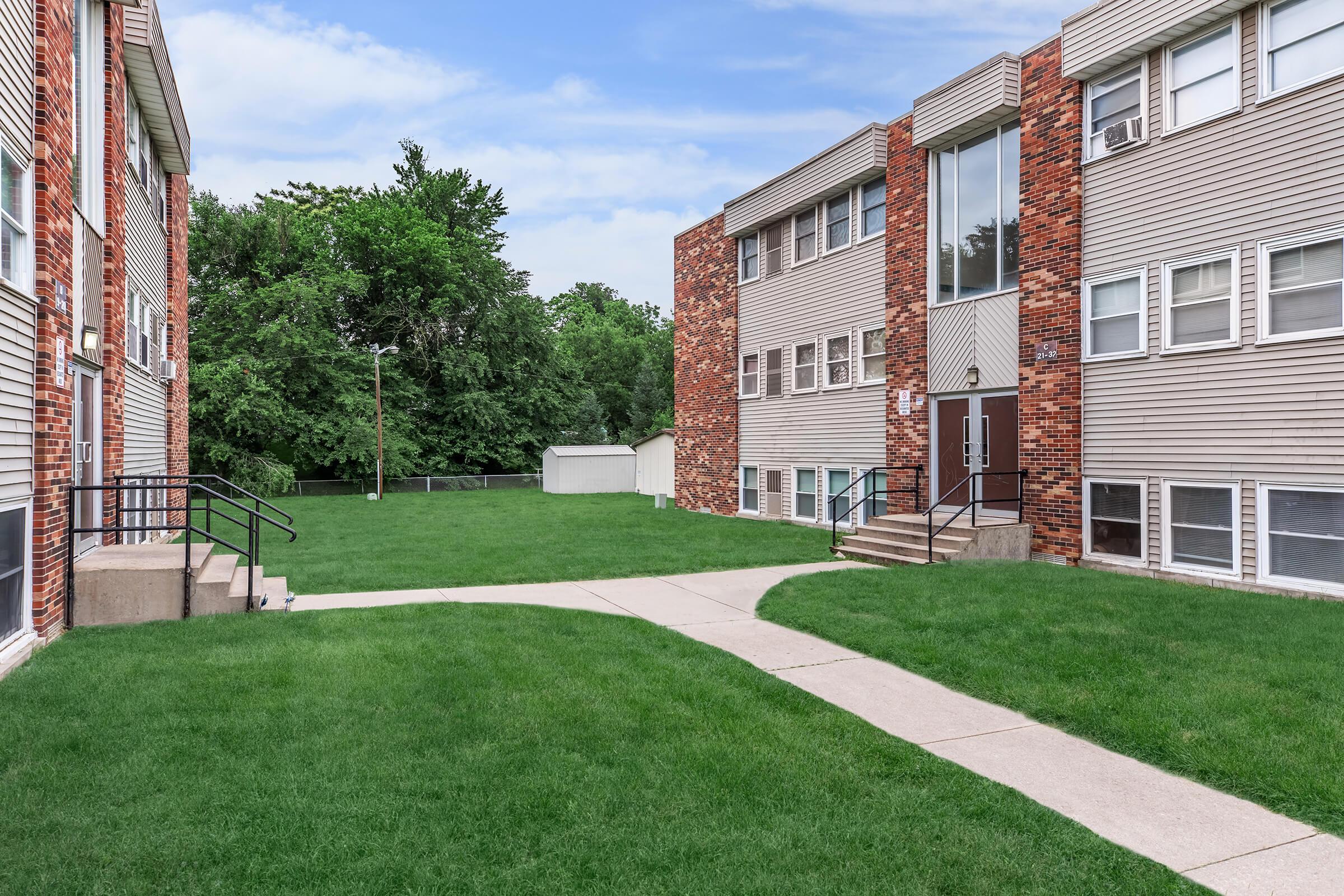 a large lawn in front of a building