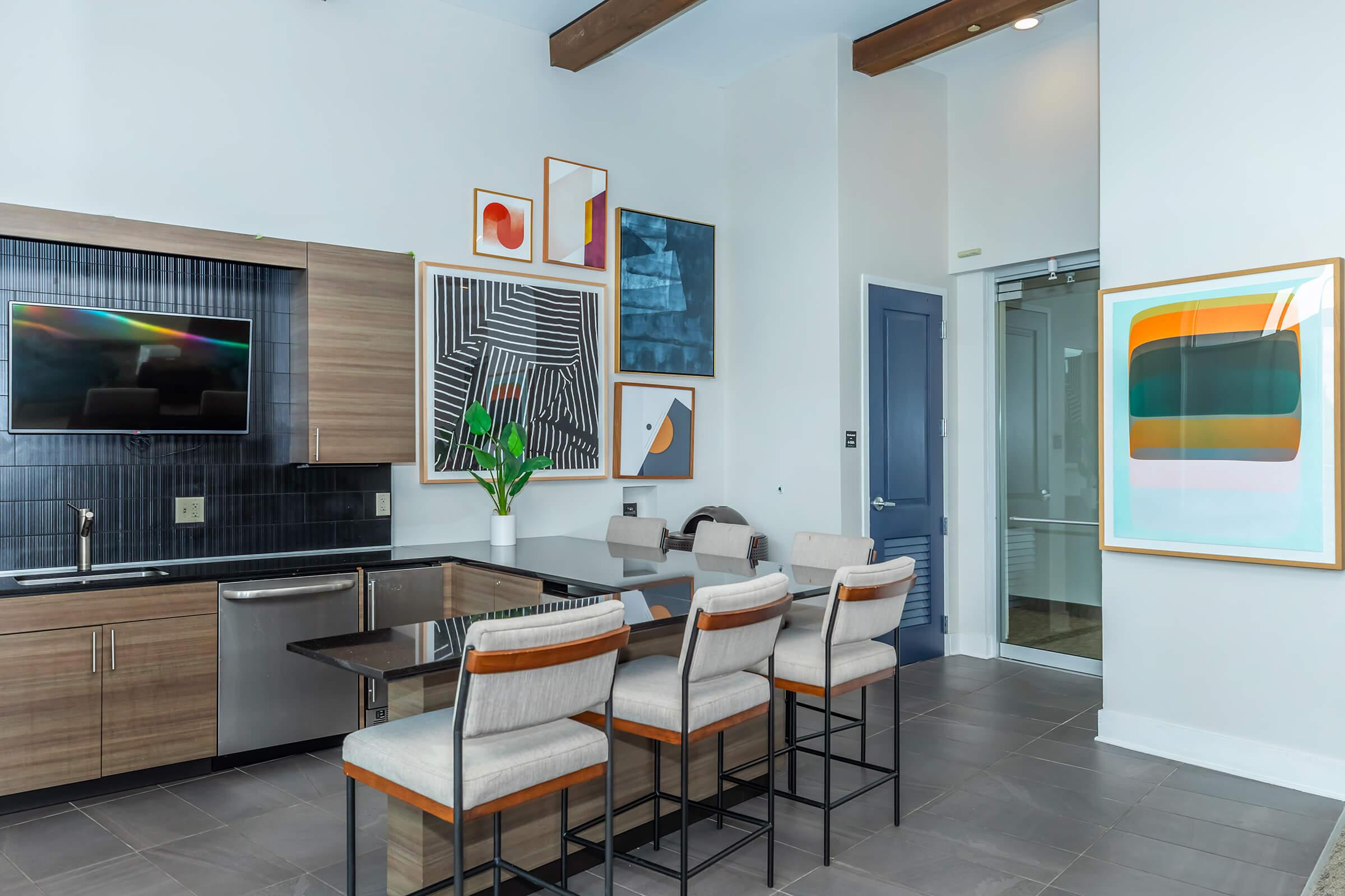 a kitchen with a table in a room