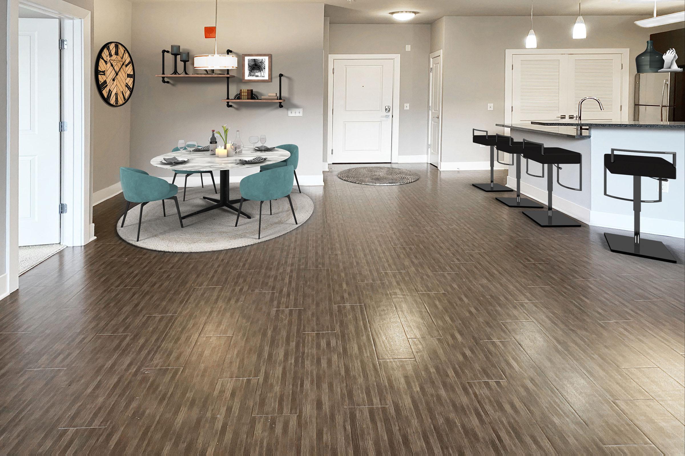 a room filled with furniture on top of a wooden floor