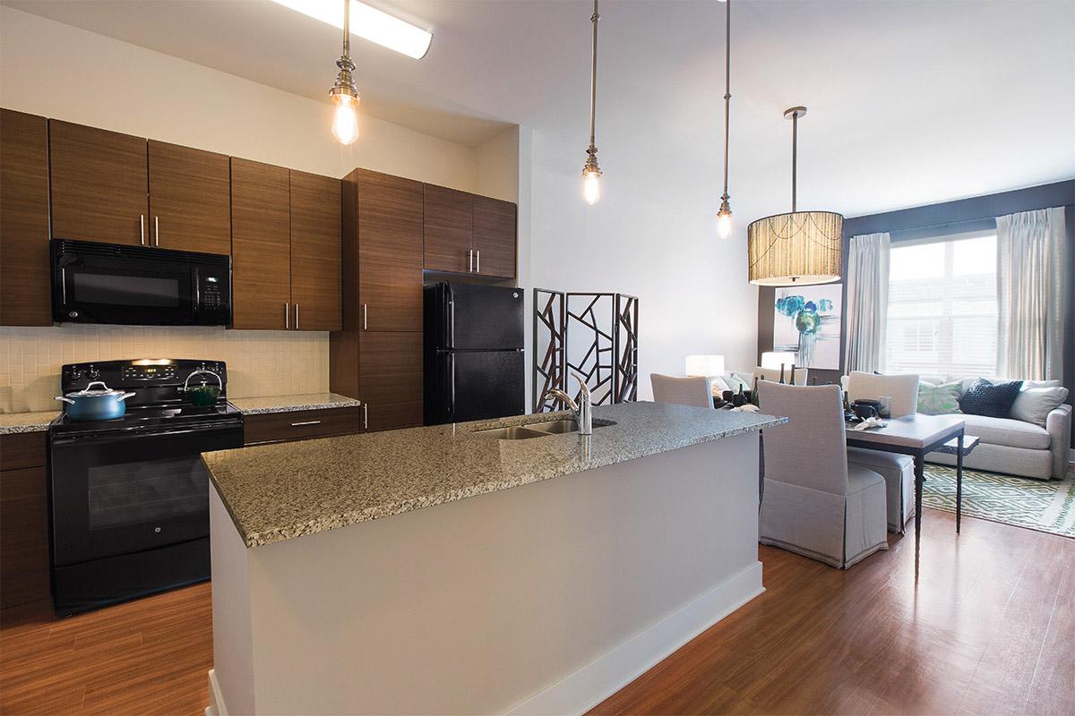 a modern kitchen with stainless steel appliances