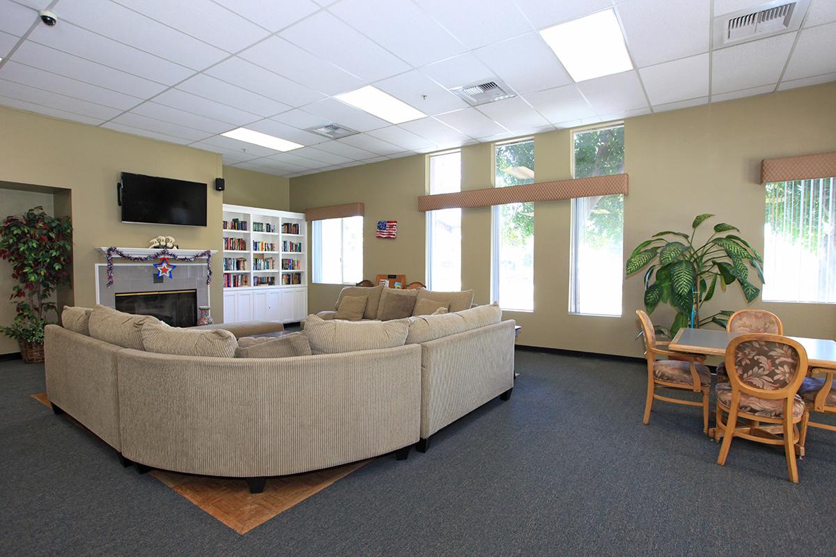 Community room filled with furniture