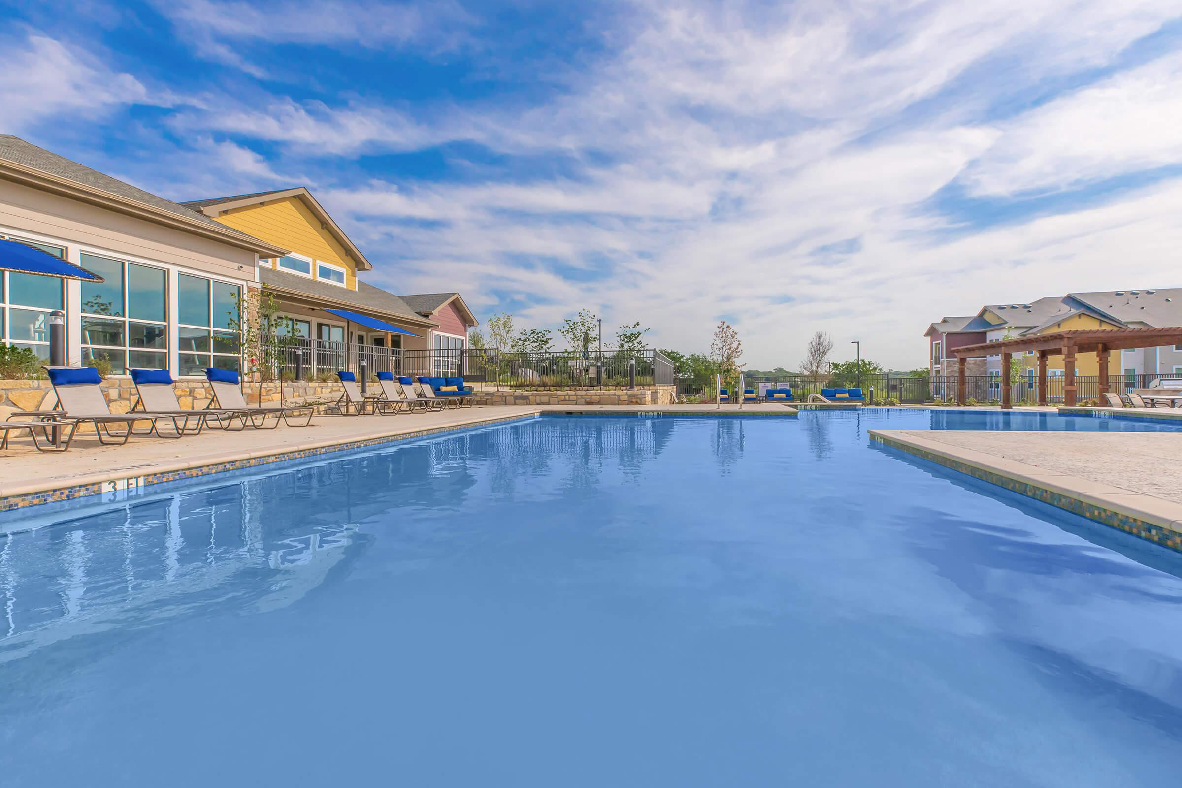 a pool next to a body of water