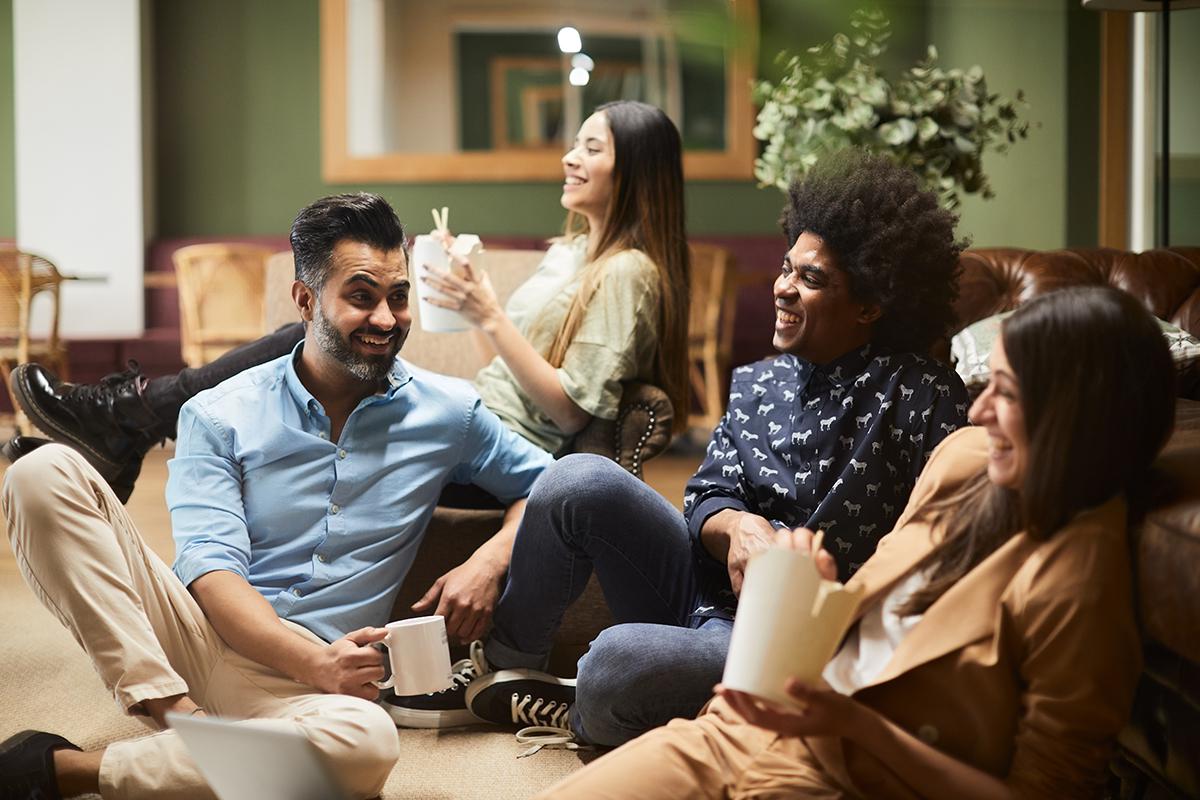 a group of people sitting at a table