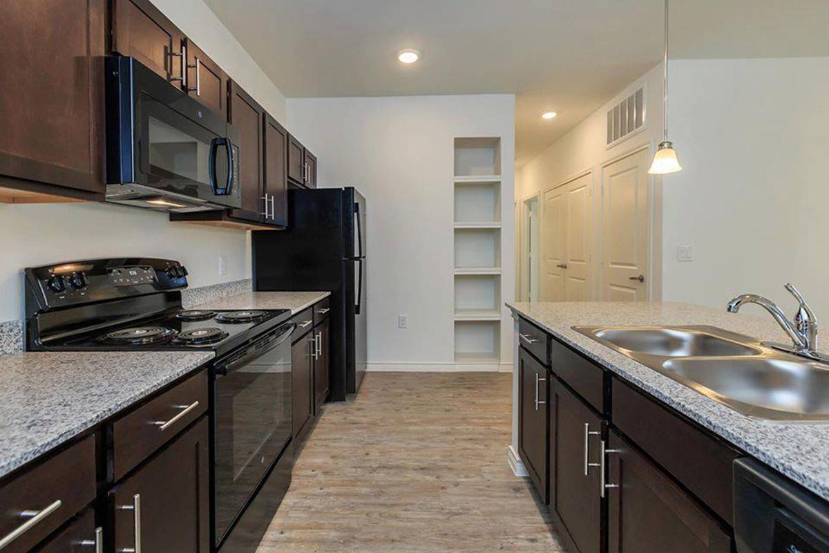 a modern kitchen with stainless steel appliances