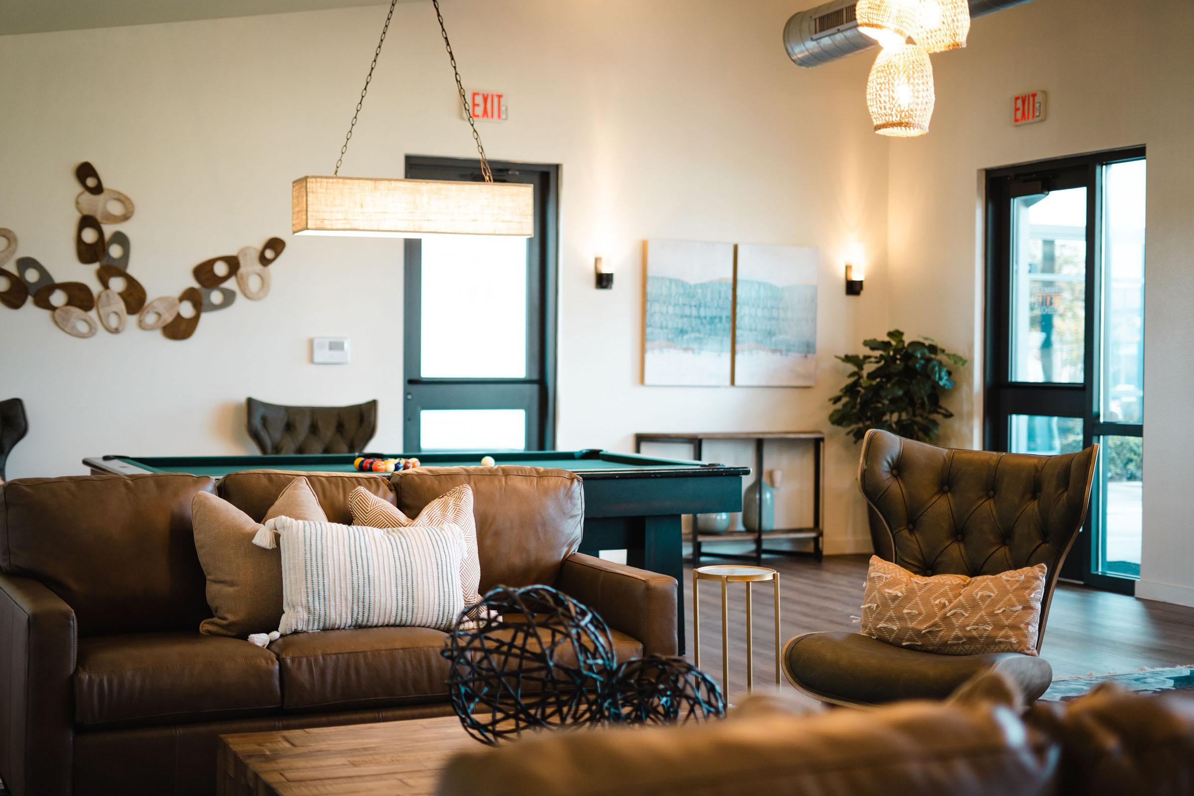 a living room filled with furniture and a fire place