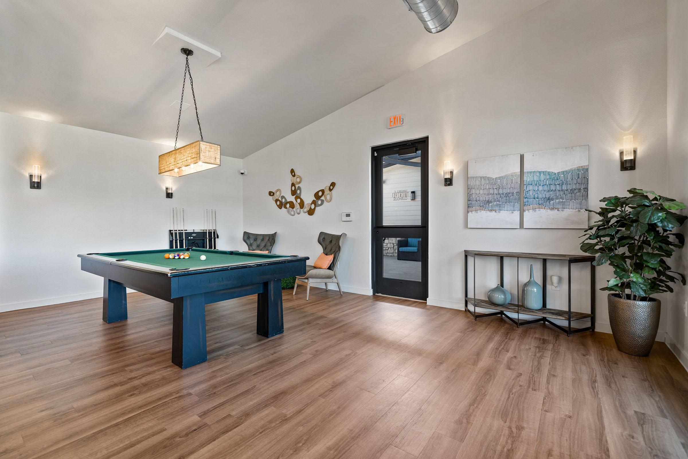 a living room with a wood floor