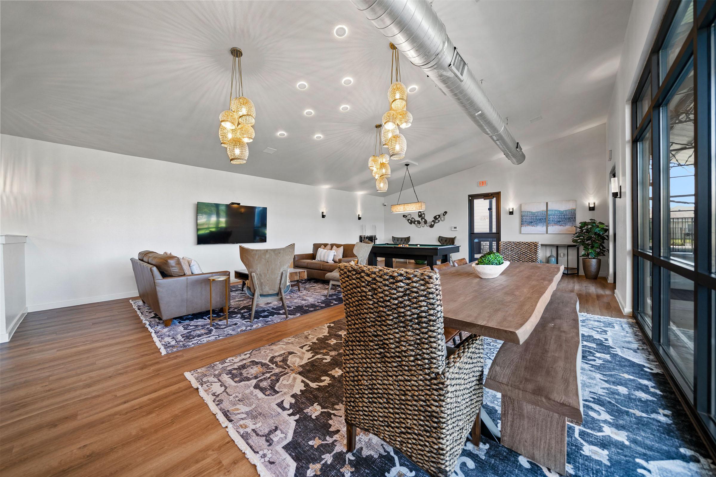 a living room with a wooden table