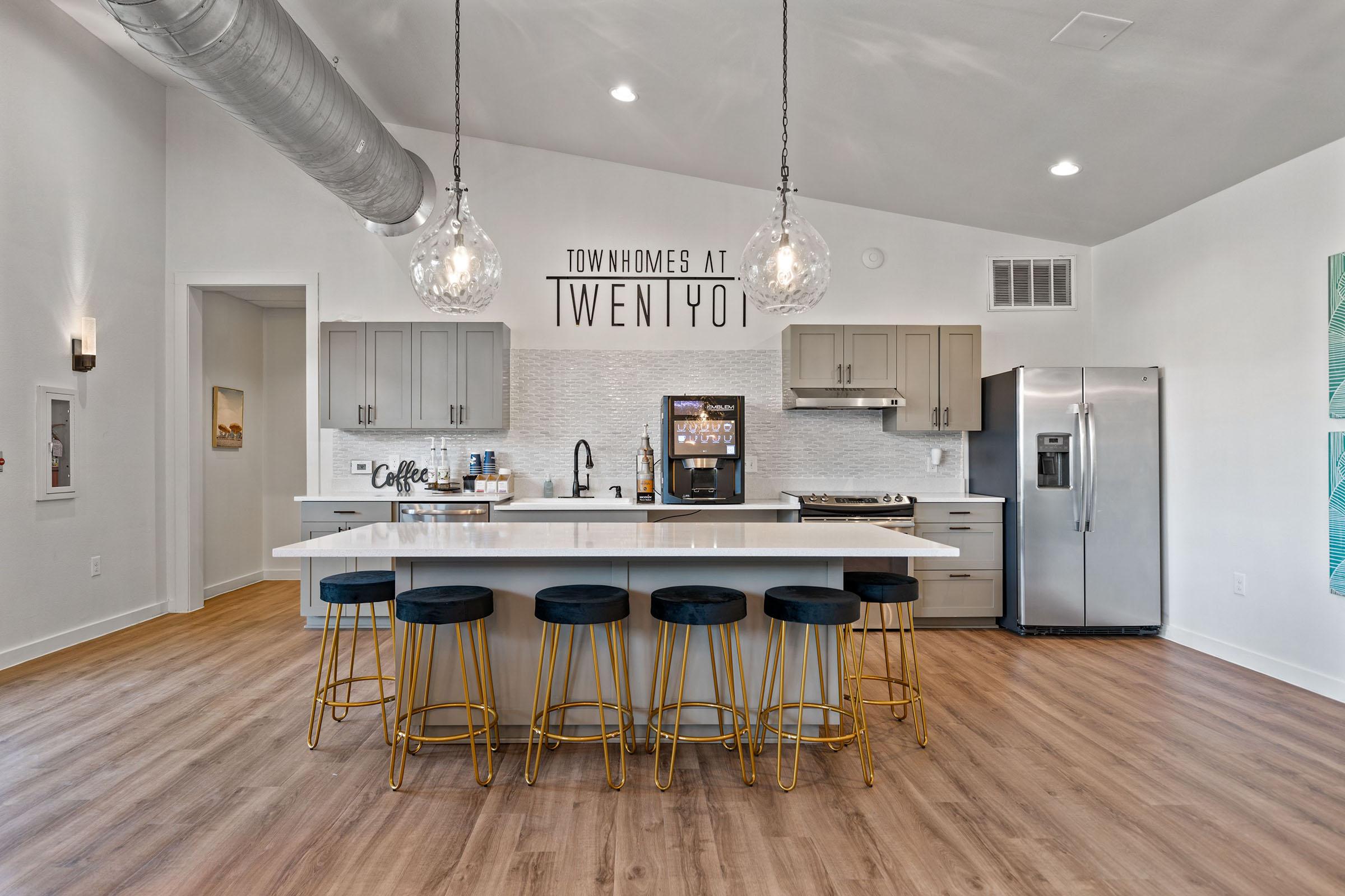 a kitchen with a wood floor