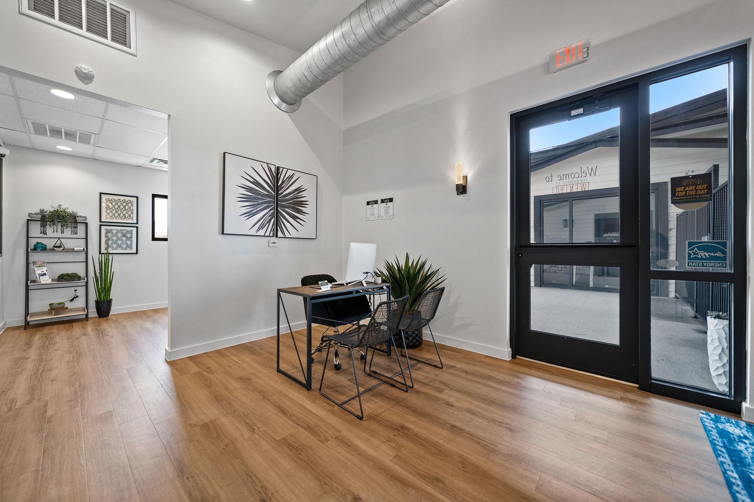 a living room with a wooden floor