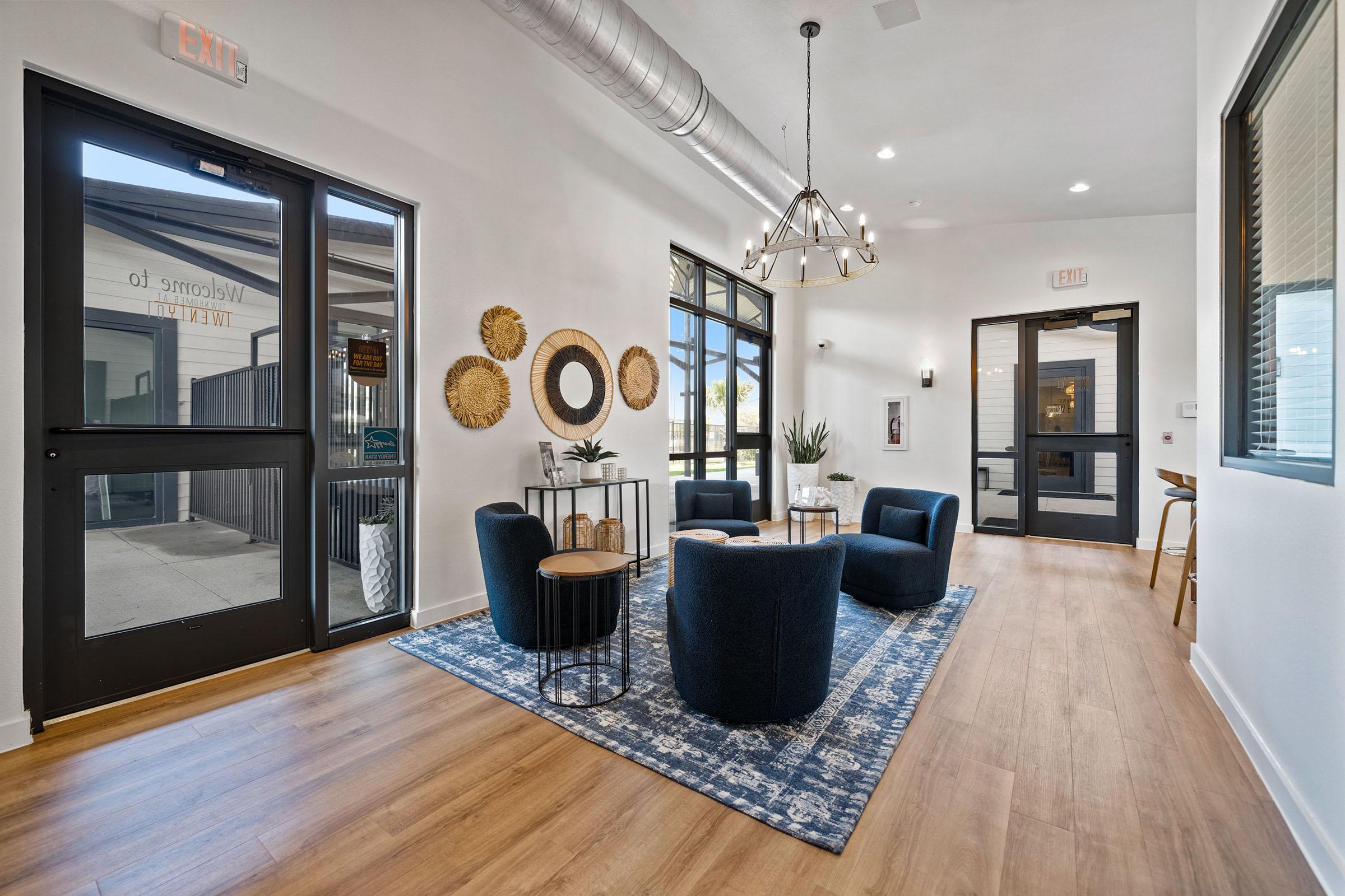 a room filled with furniture and a large window