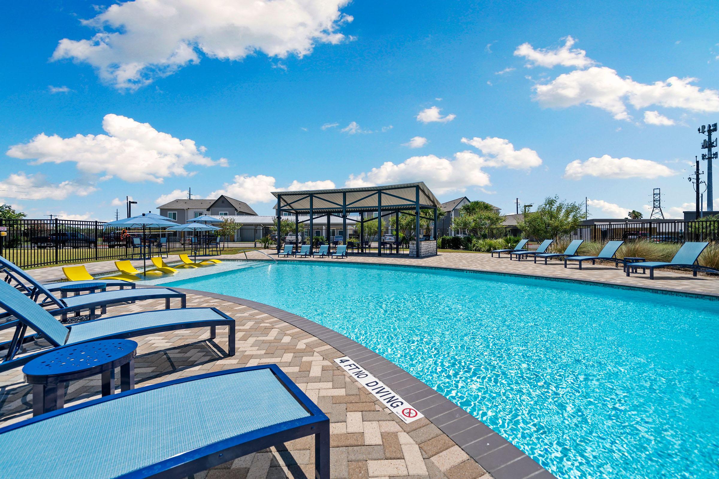 a pool next to a body of water