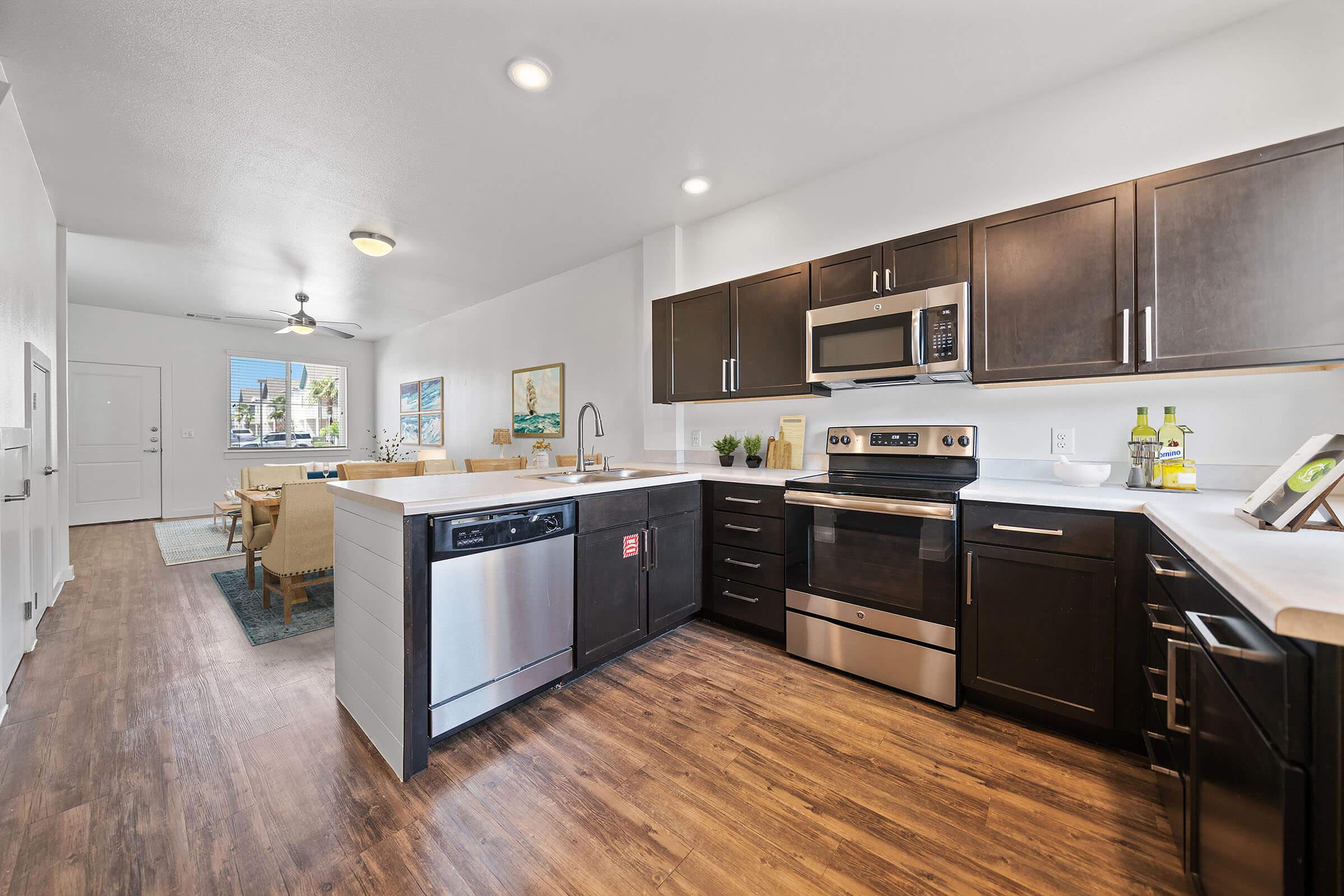 a modern kitchen with stainless steel appliances