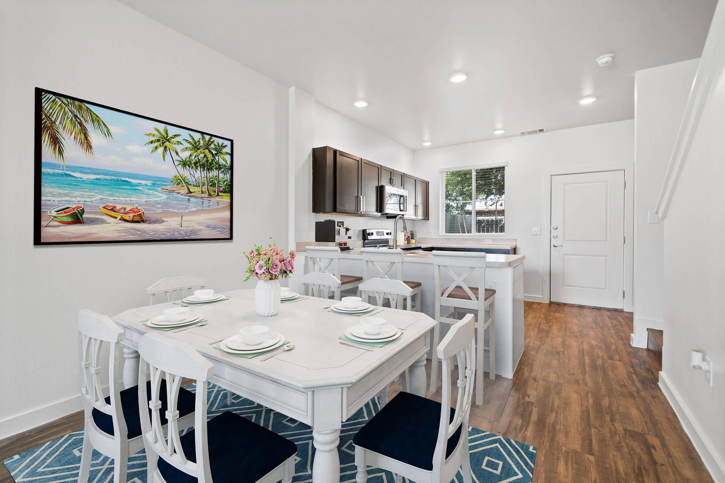 a kitchen with a table in a room