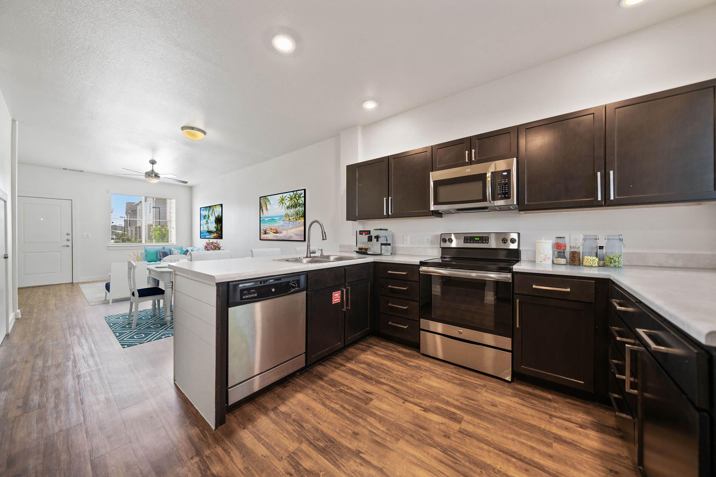 a modern kitchen with stainless steel appliances