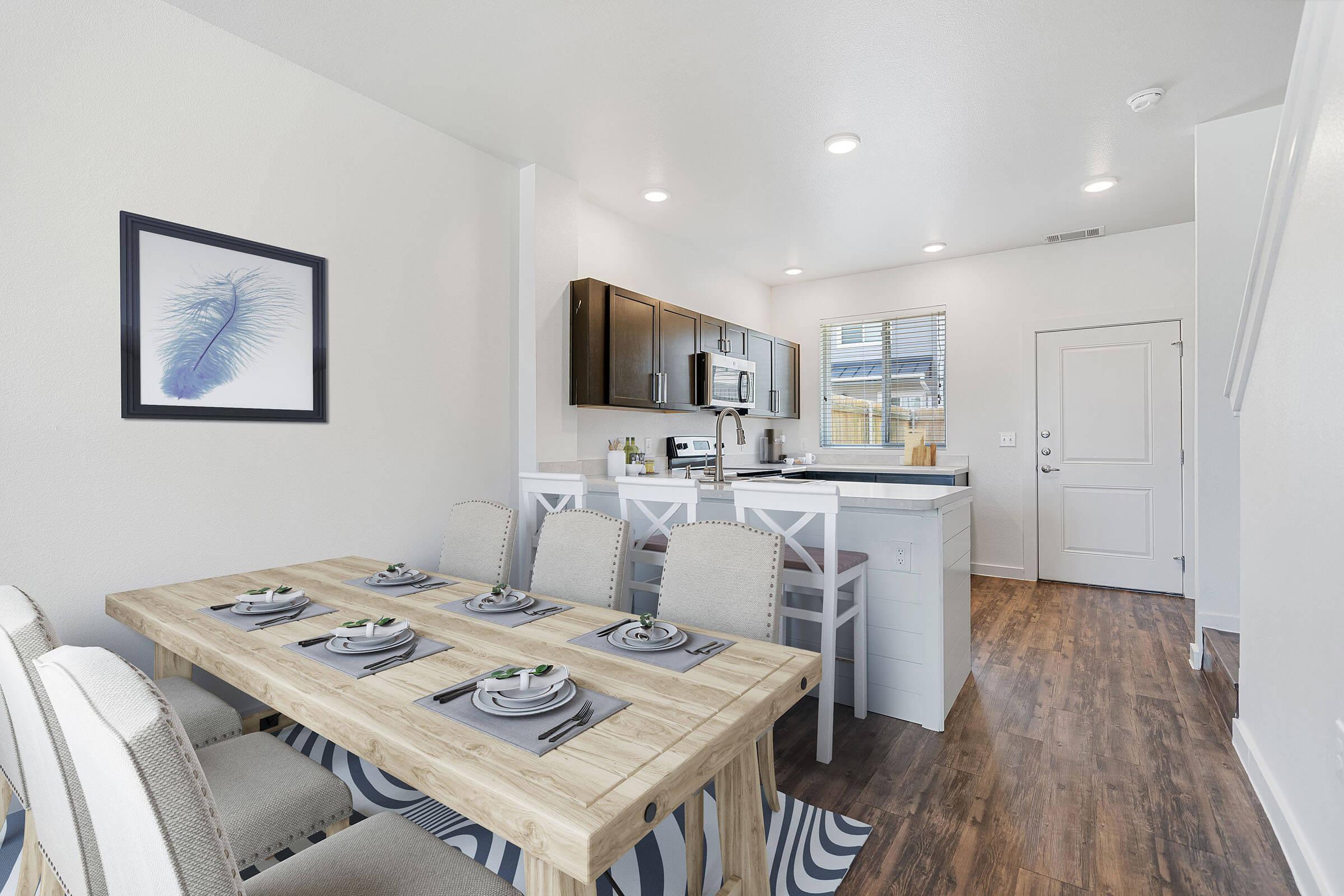 a kitchen with a sink and a mirror