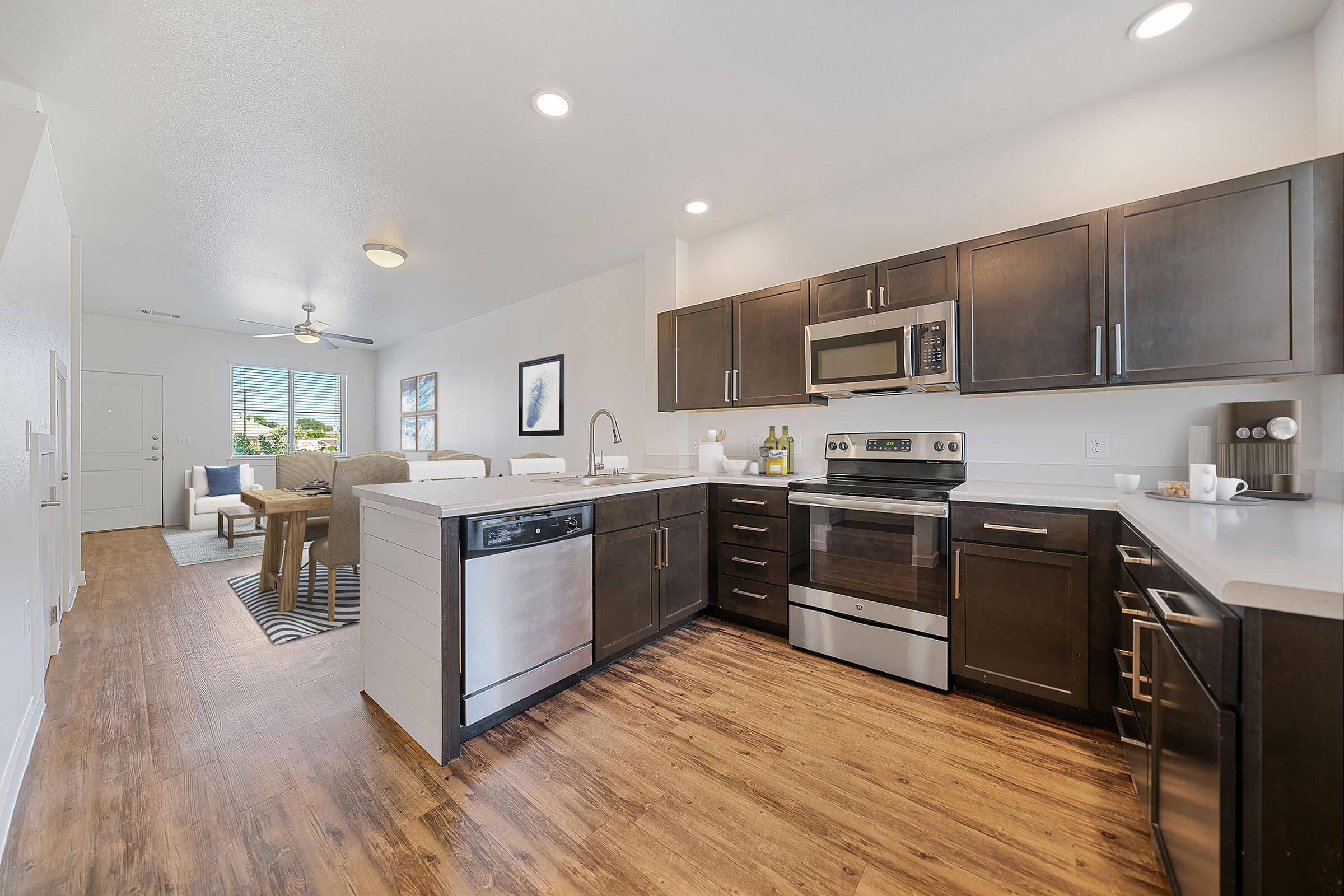 a modern kitchen with stainless steel appliances