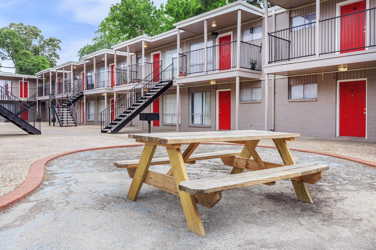 Picnic table next to community buildings