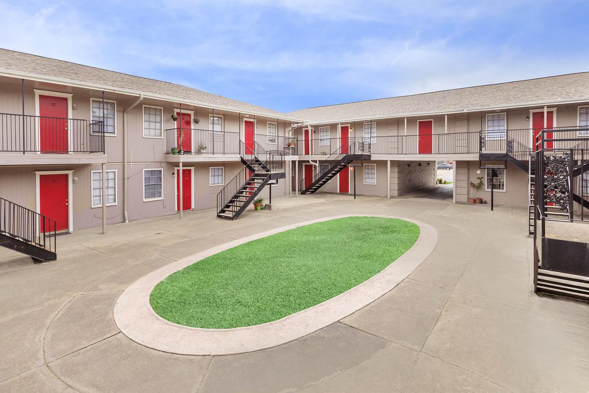 Villas at Park Place courtyard with green grass