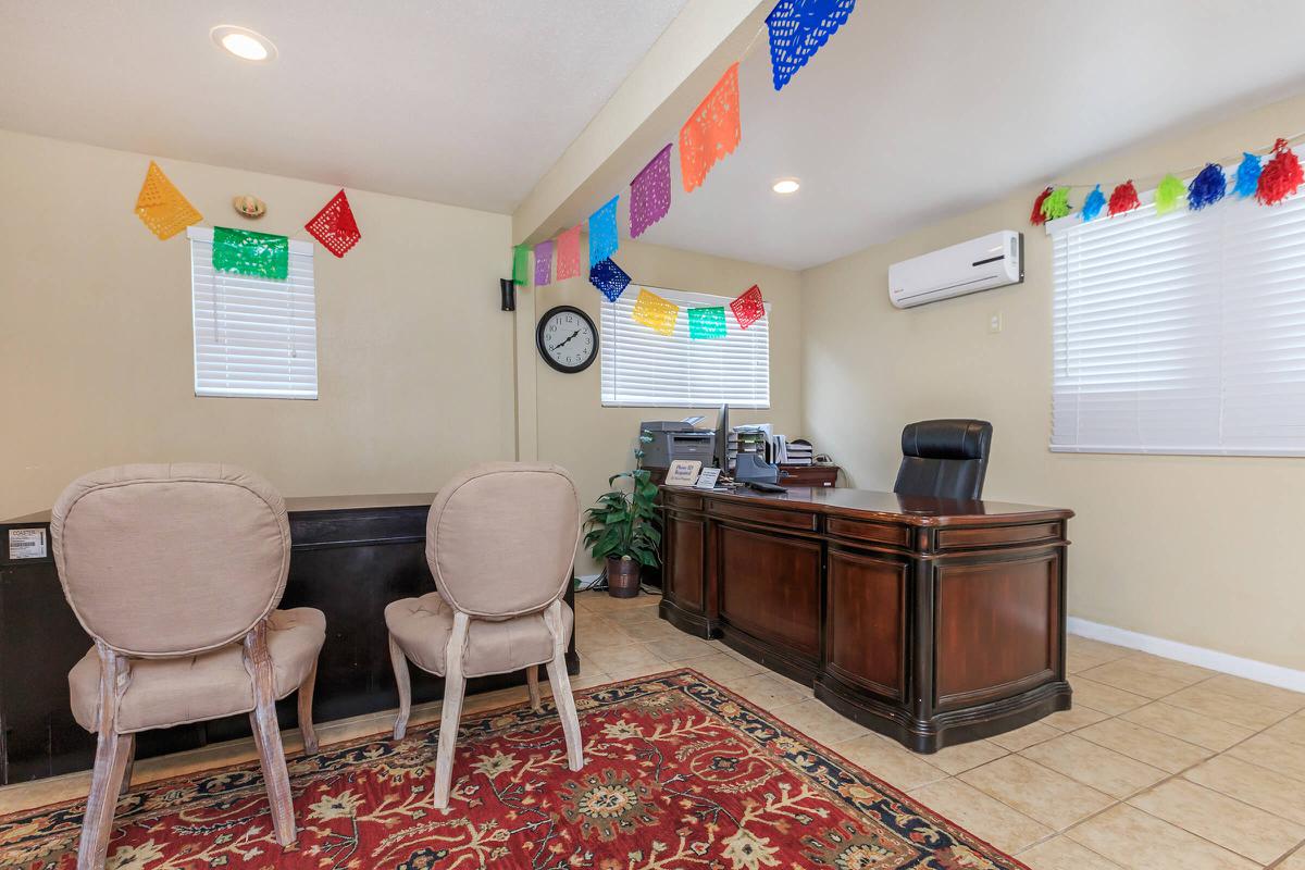 Villas at Park Place leasing office with a wooden desk