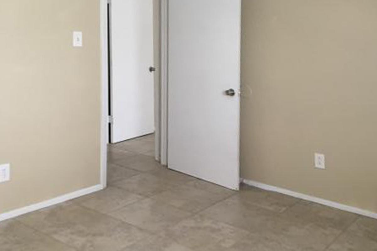 Bedroom with tile floors