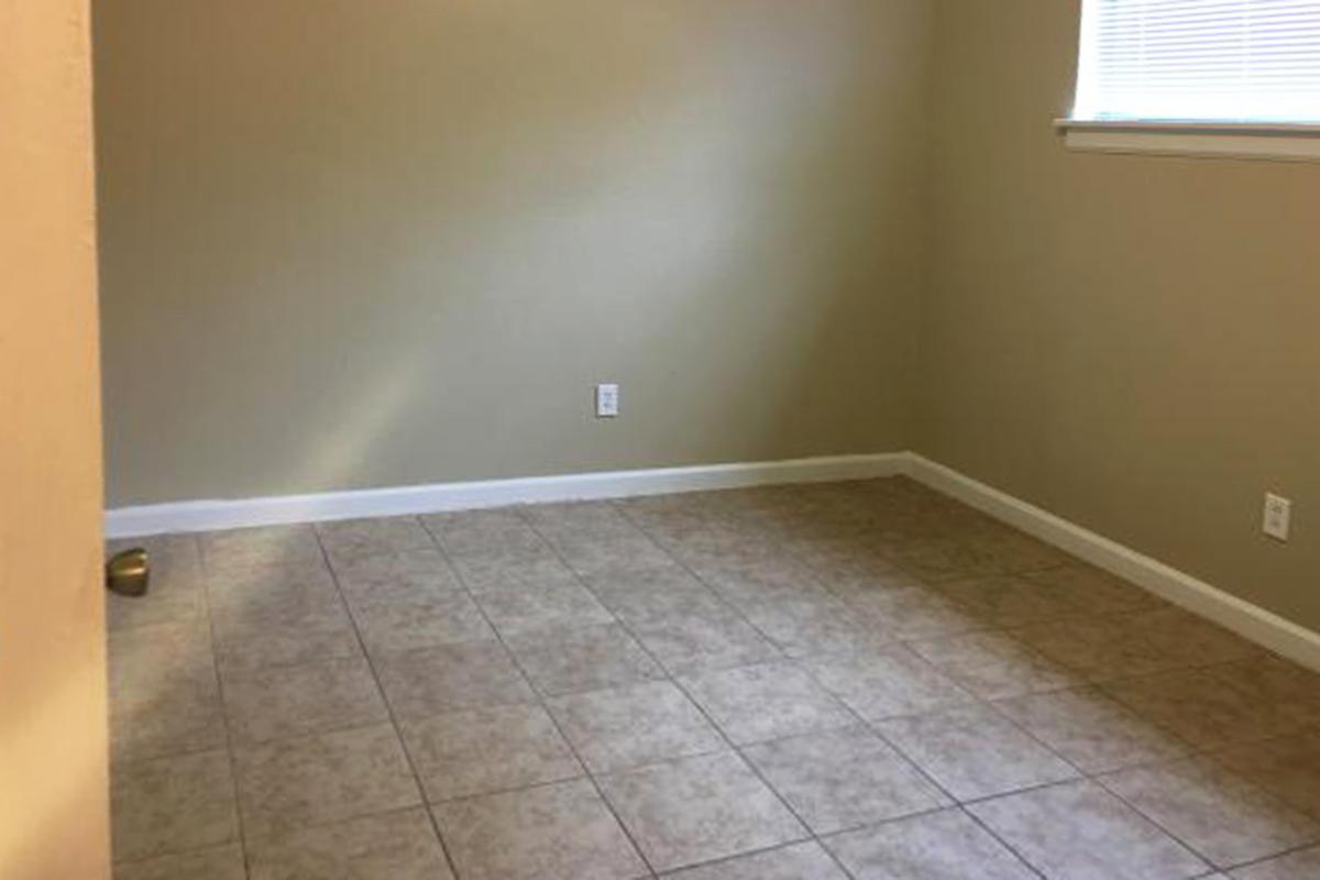 Tile floors in a bedroom