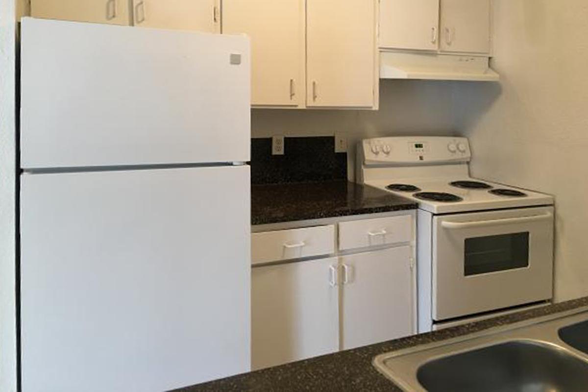 Kitchen with white appliances