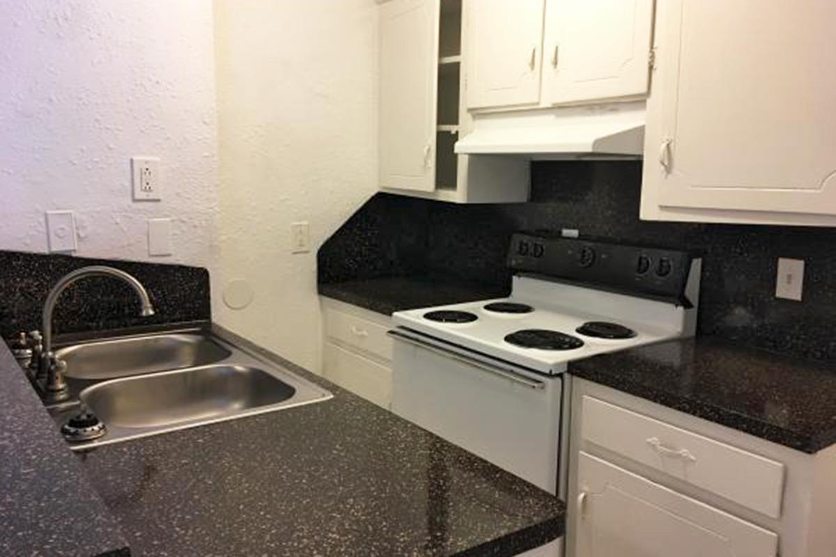 Kitchen with white cabinets