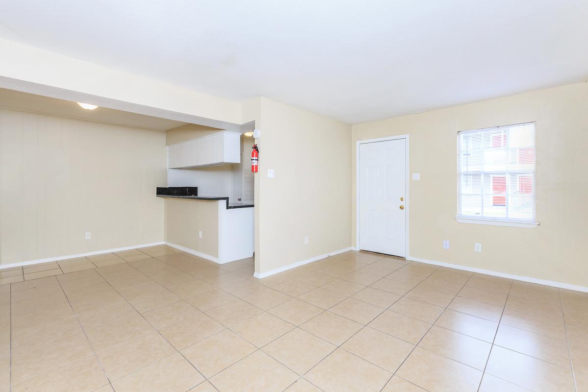 Living room and dining room with tile floors